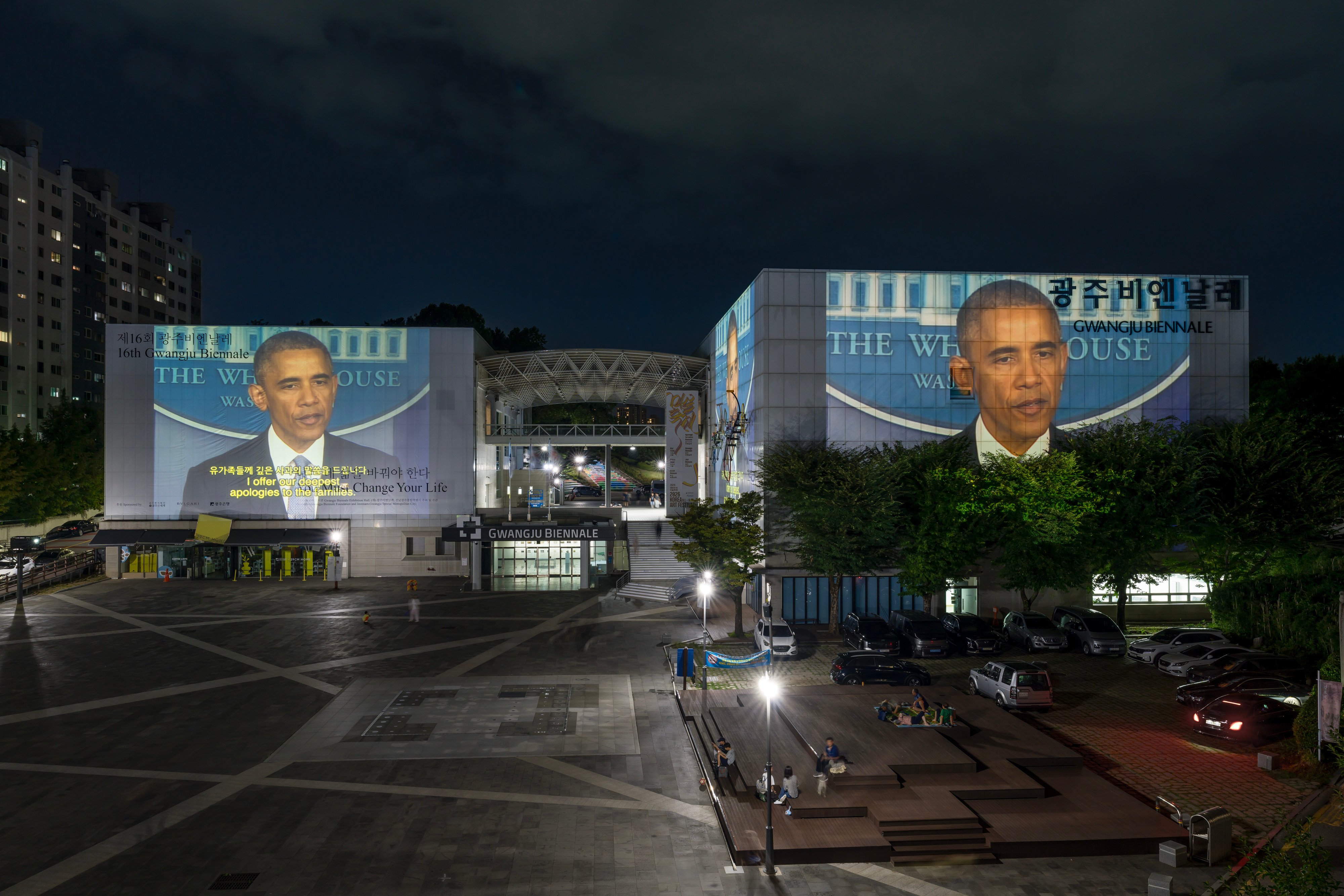 James T. Hong’s “Apologies” (2012-) is projected on the outside of the Gwangju Biennale Exhibition Hall. The ongoing video compilation of politicians’ public apologies is projected on the exhibition hall every night for the duration of the biennale. Photo: courtesy of James T. Hong and Empty Gallery