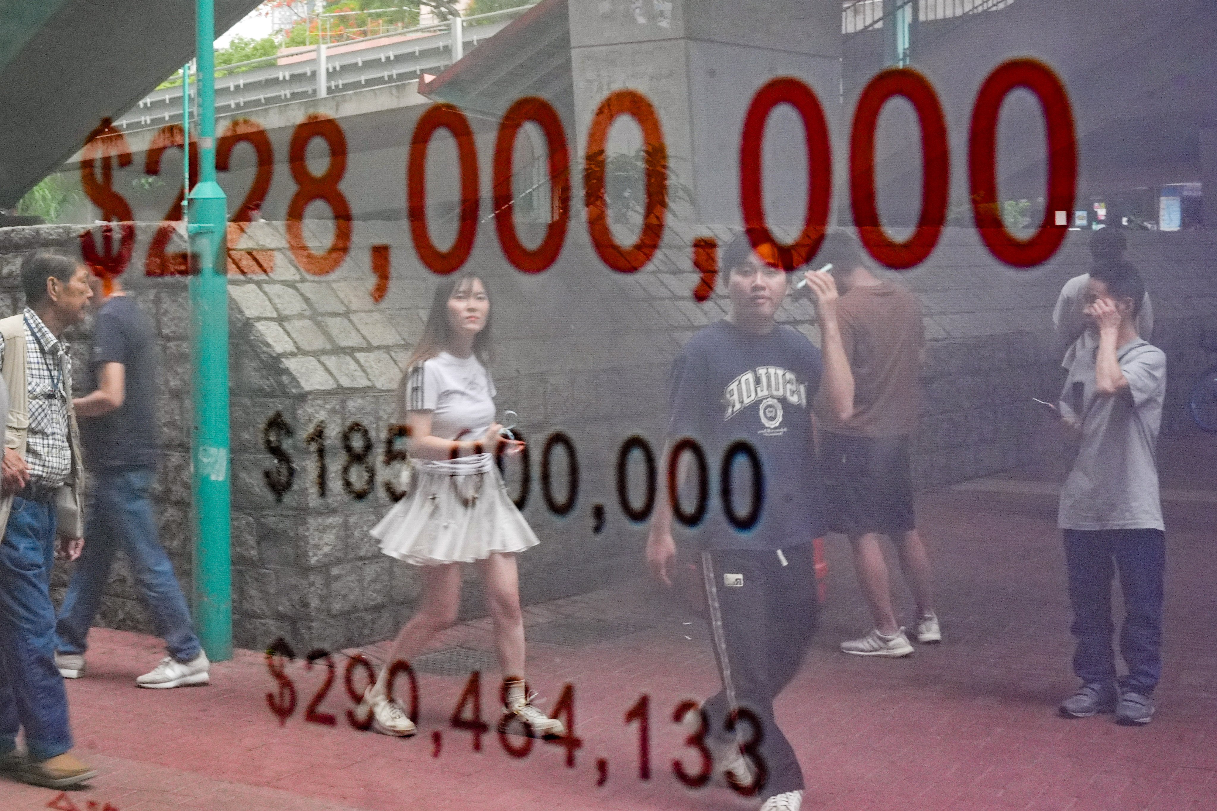 The group won the HK$30 million prize in the September 5 draw, part of the record HK$228 million “snowball” jackpot marking the 50th anniversary of Mark Six. Photo: Eugene Lee