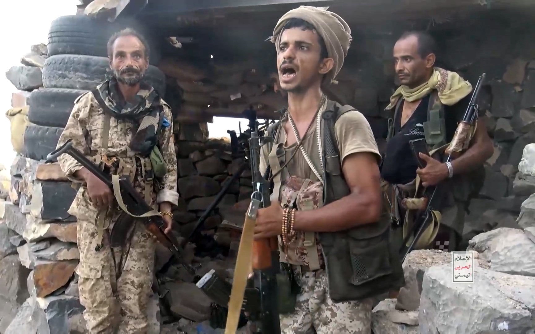 Houthi fighters at a seized camp during their offensive in western Yemen. Photo: Houthi Military Media via EPA