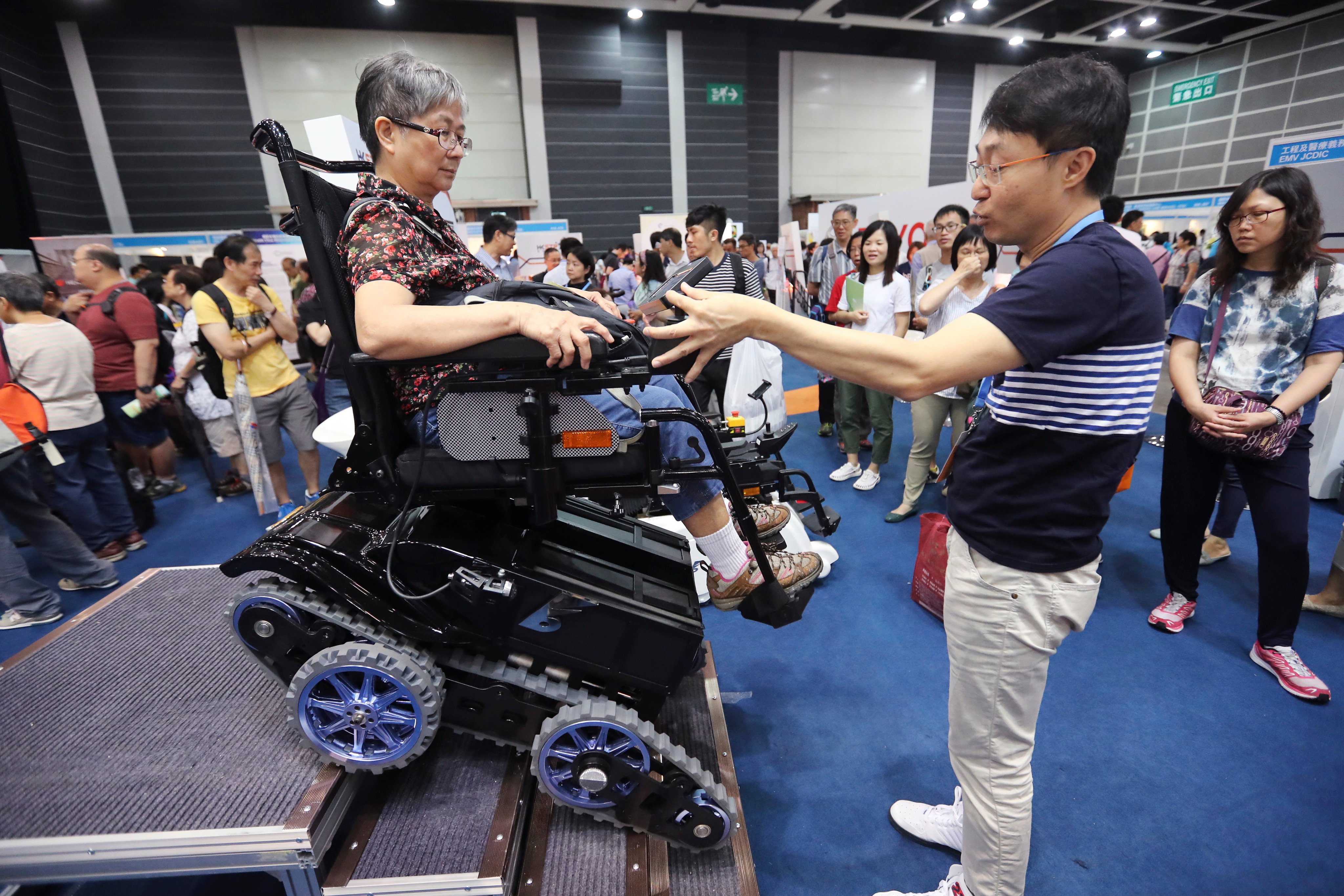 Visitors attend a gerontechnology event at Hong Kong Convention and Exhibition Centre, Wan Chai. Photo: Edward Wong