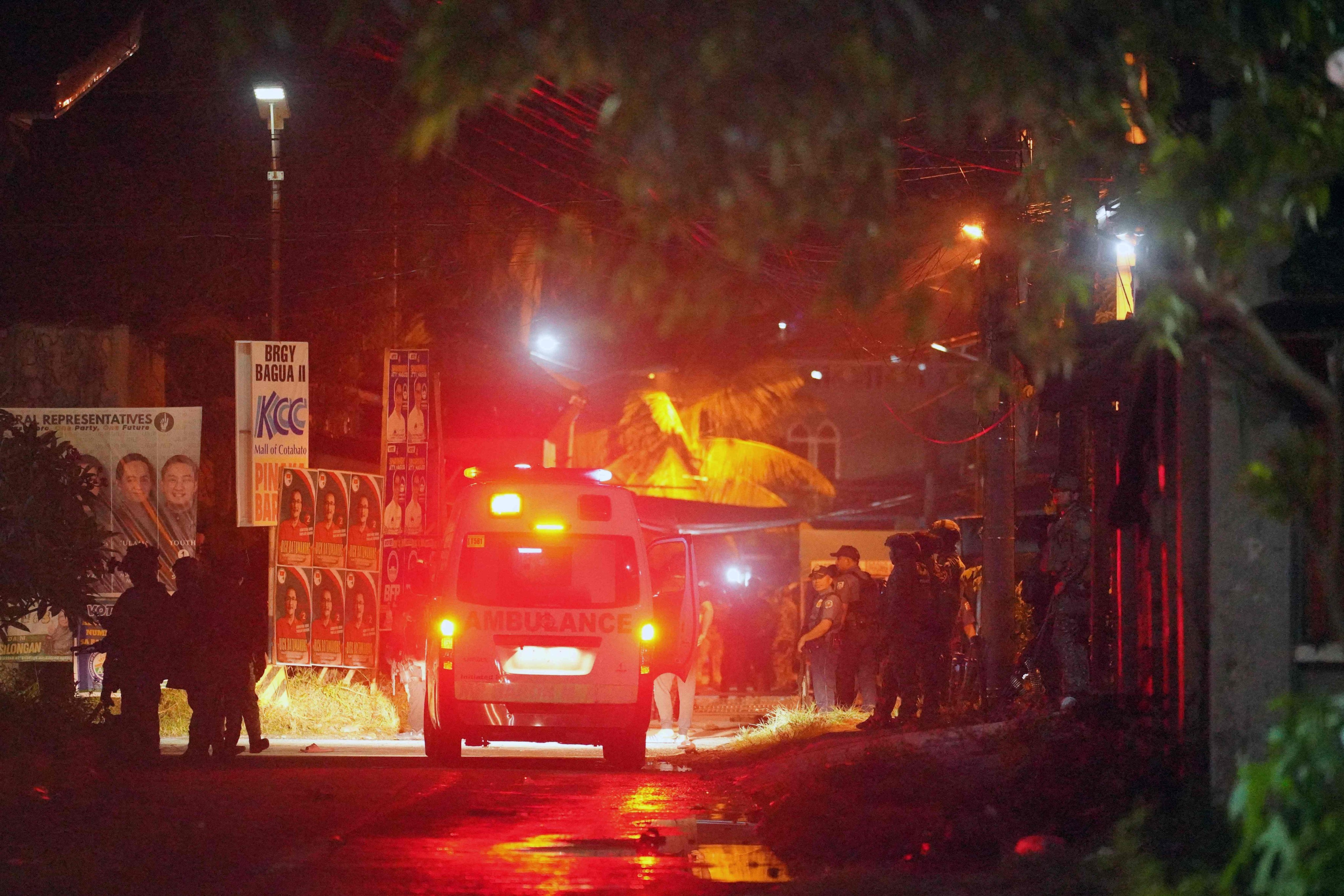 An ambulance is parked near the scene of a shooting incident outside a polling station in Bangsamoro’s Cotabato City early on Monday. Photo: AFP