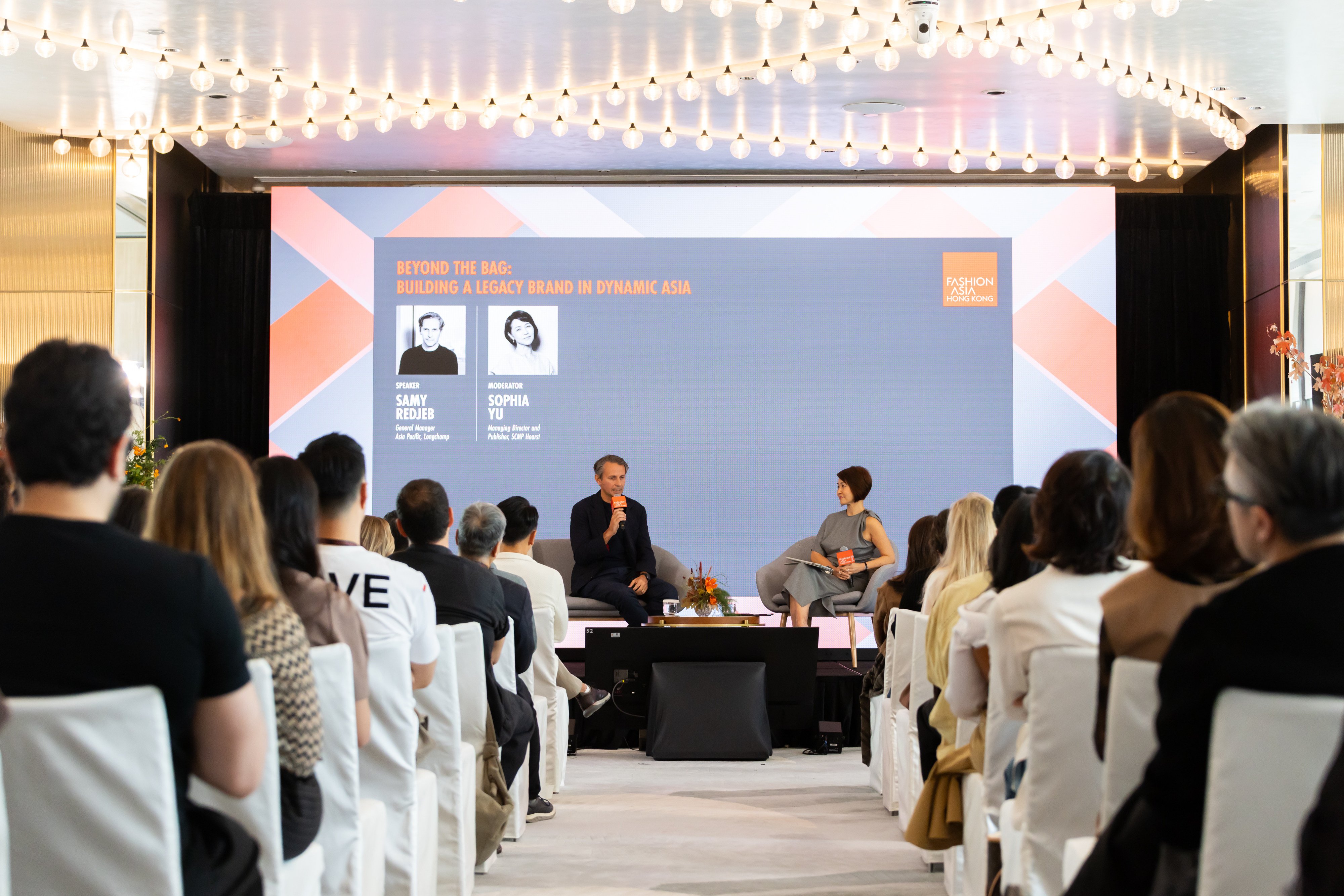 SCMP Hearst managing director and publisher Sophia Yu onstage with Longchamp Asia-Pacific general manager Samy Redjeb. Photo: Handout