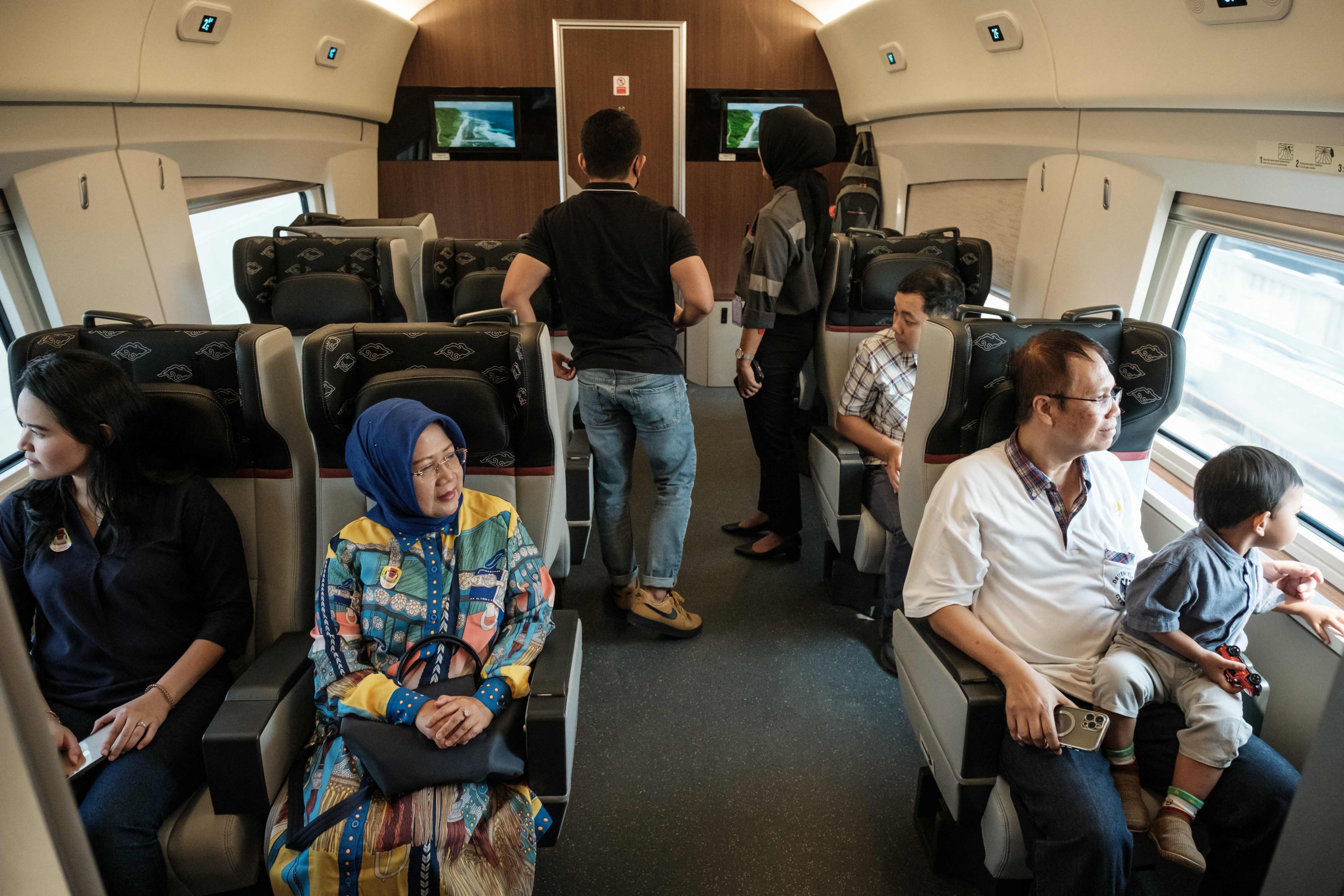 Passengers ride in the first class section of the Jakarta-Bandung high-speed train in September 2023. Photo: AFP
