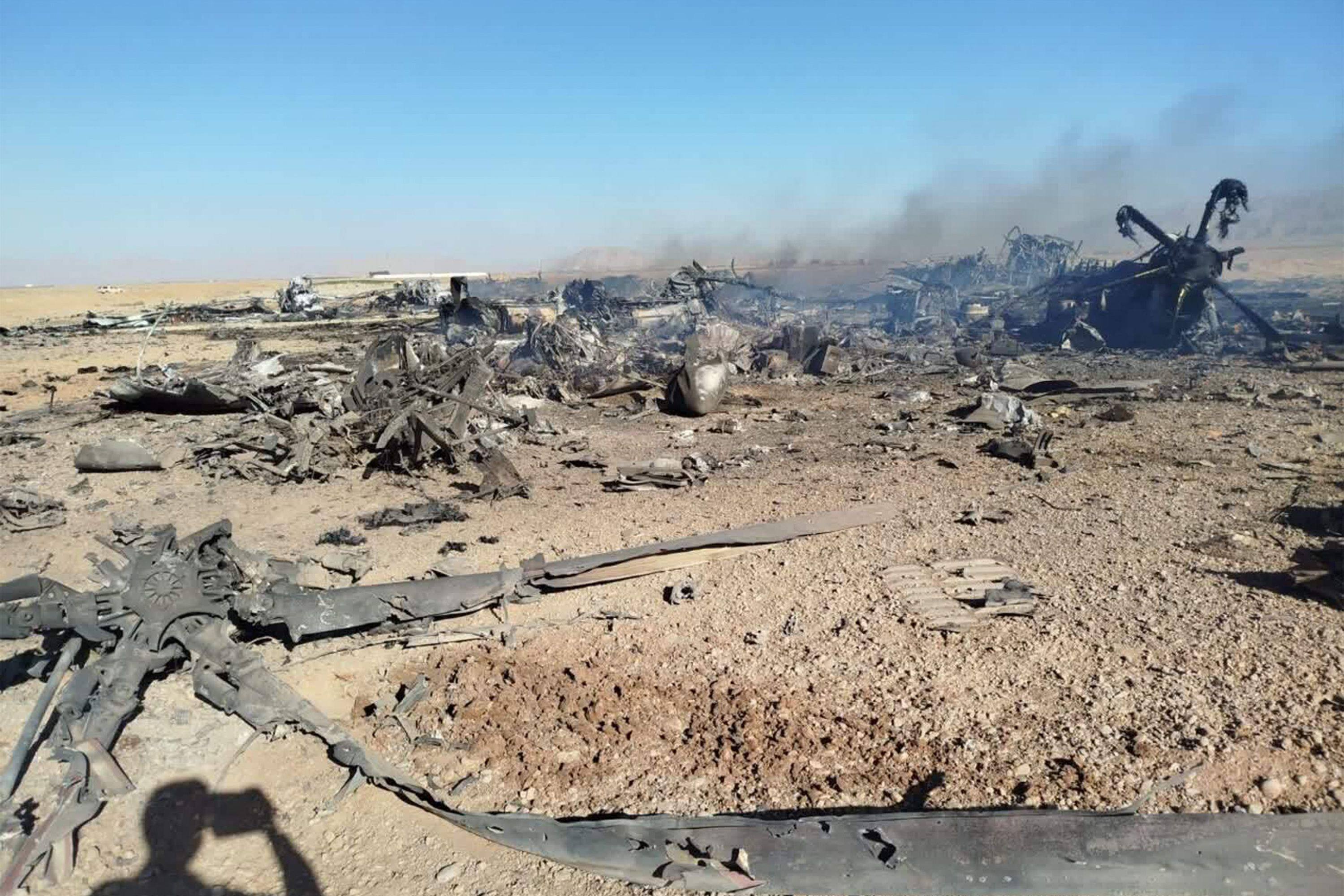Wreckage of a military aircraft downed during operations in central Iran. Photo: Sepah News via AFP