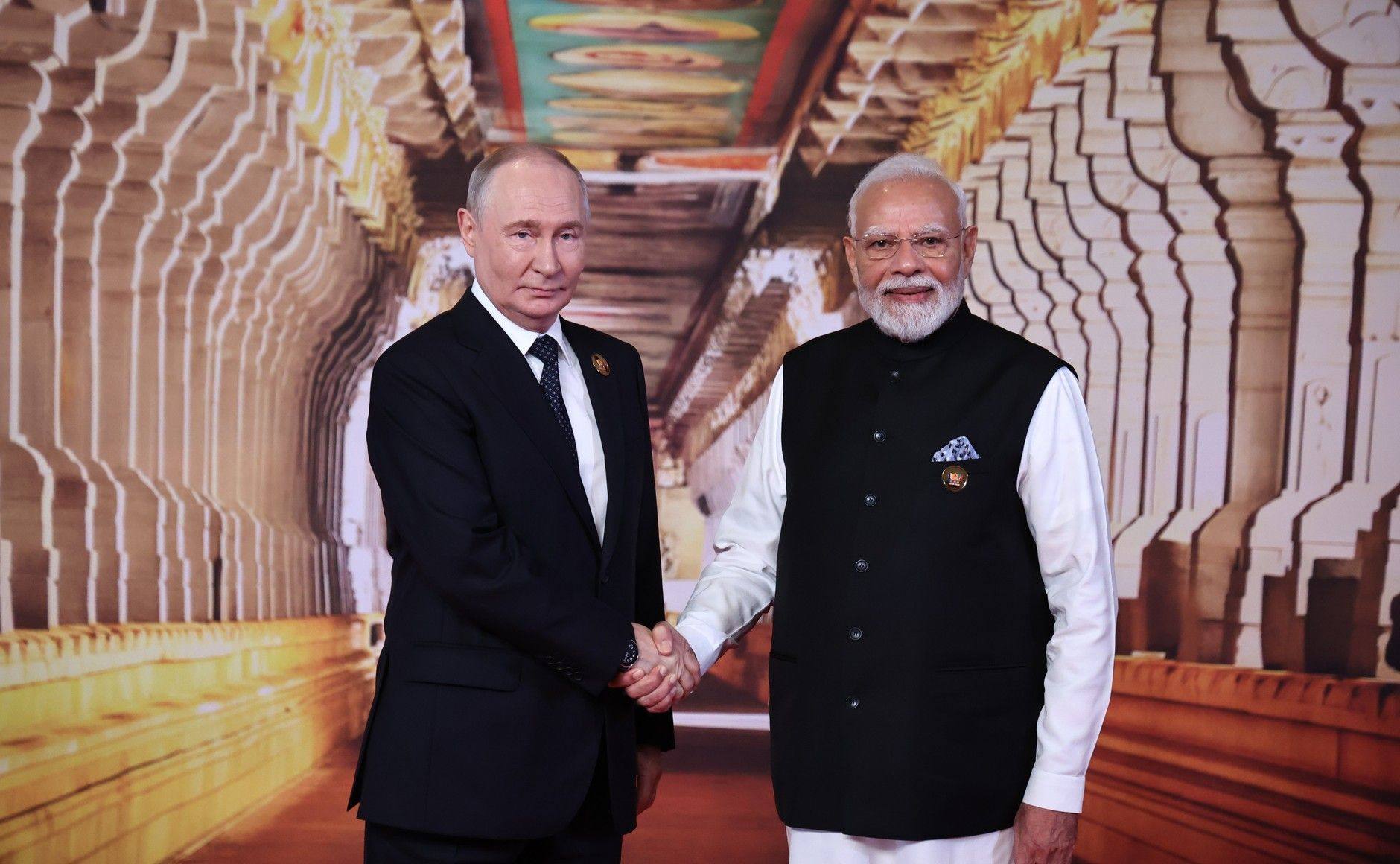 India’s Prime Minister Narendra Modi welcomes Russian President Vladimir Putin to the Brics summit in New Delhi on Saturday. Photo: Kremlin/dpa