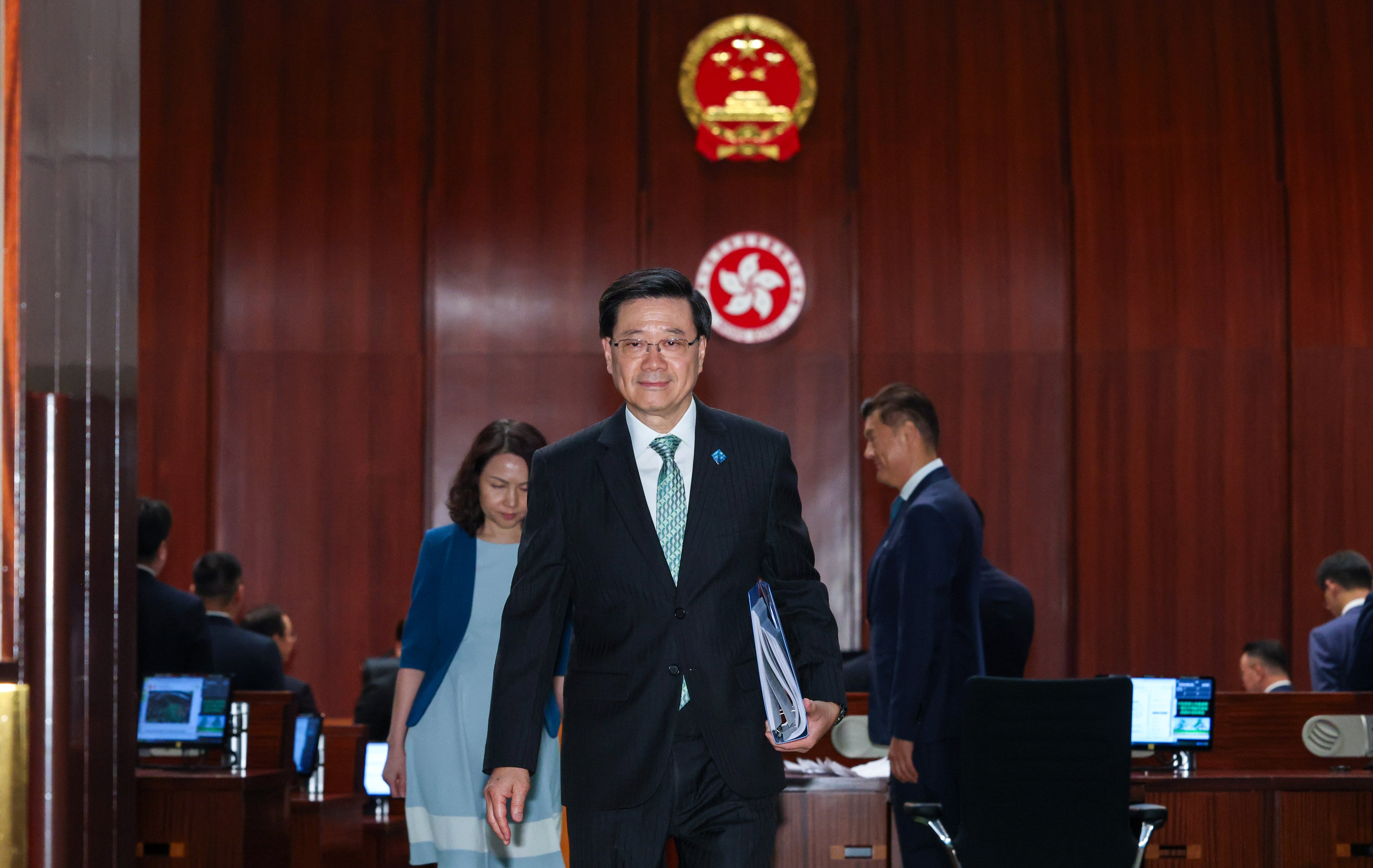 Chief Executive John Lee leaves the Legislative Council chamber after delivering Hong Kong’s first five-year plan and the annual policy address. Photo: Dickson Lee