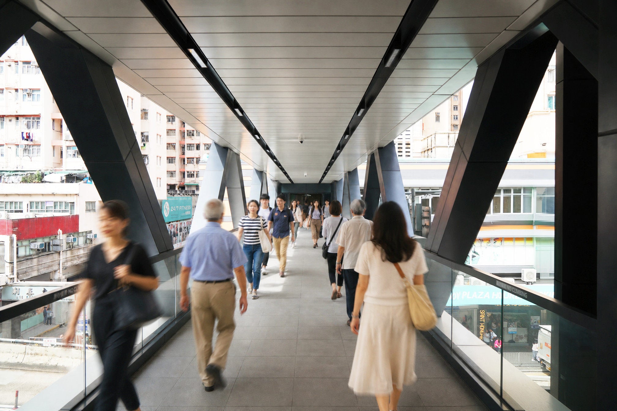 The new Amoy Footbridge in Kowloon Bay provides a roofed connection between the East Kowloon Cultural Centre, Amoy Plaza mall, residential developments and Kowloon Bay MTR station. Photo: Hang Lung Properties