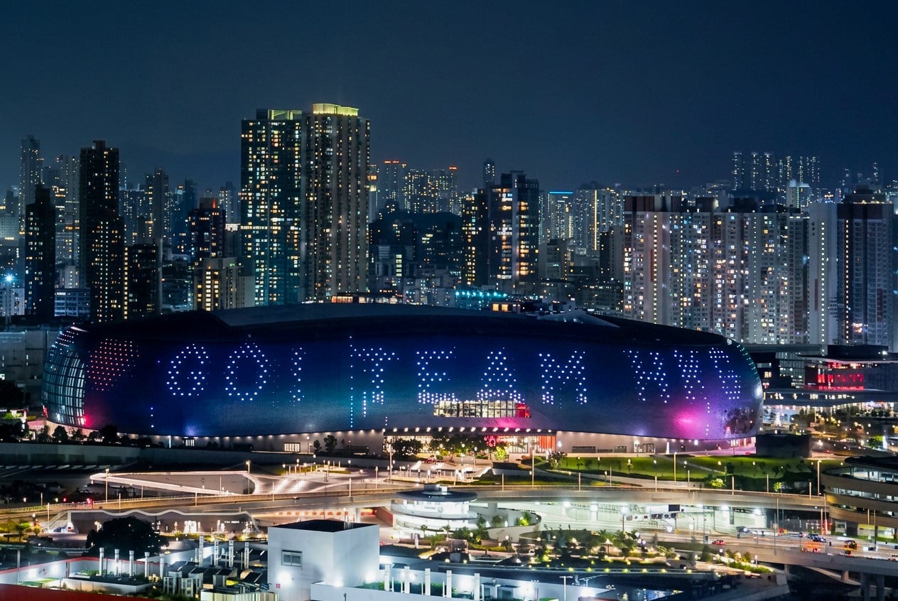 An Asian Games-themed light show projected across Kai Tak Stadium in support of the Hong Kong Team for the event starting on Saturday. Photo: Elson Li