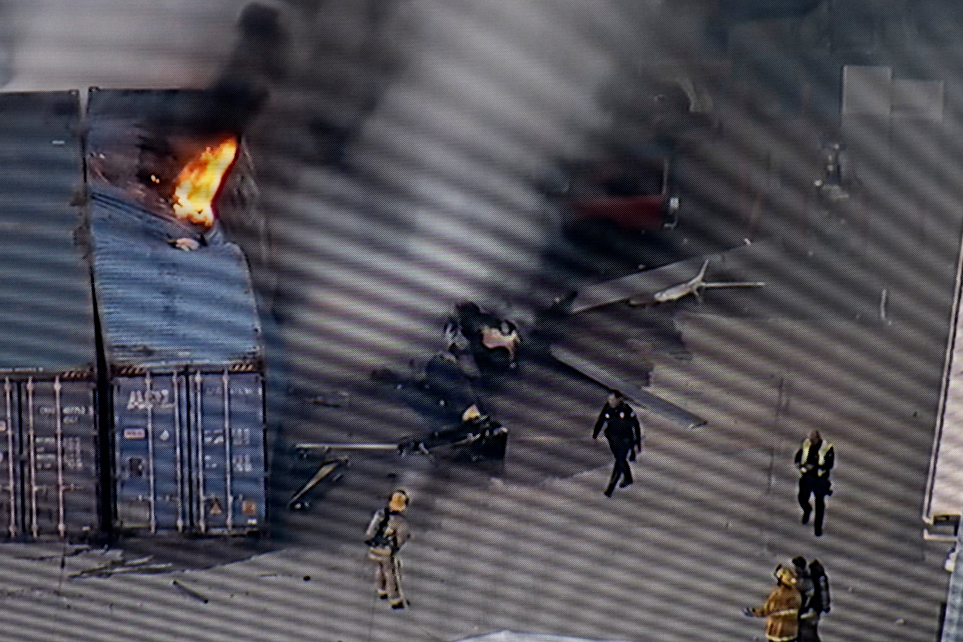 First responders at the scene of the helicopter crash. Photo: KABC-TV via AP