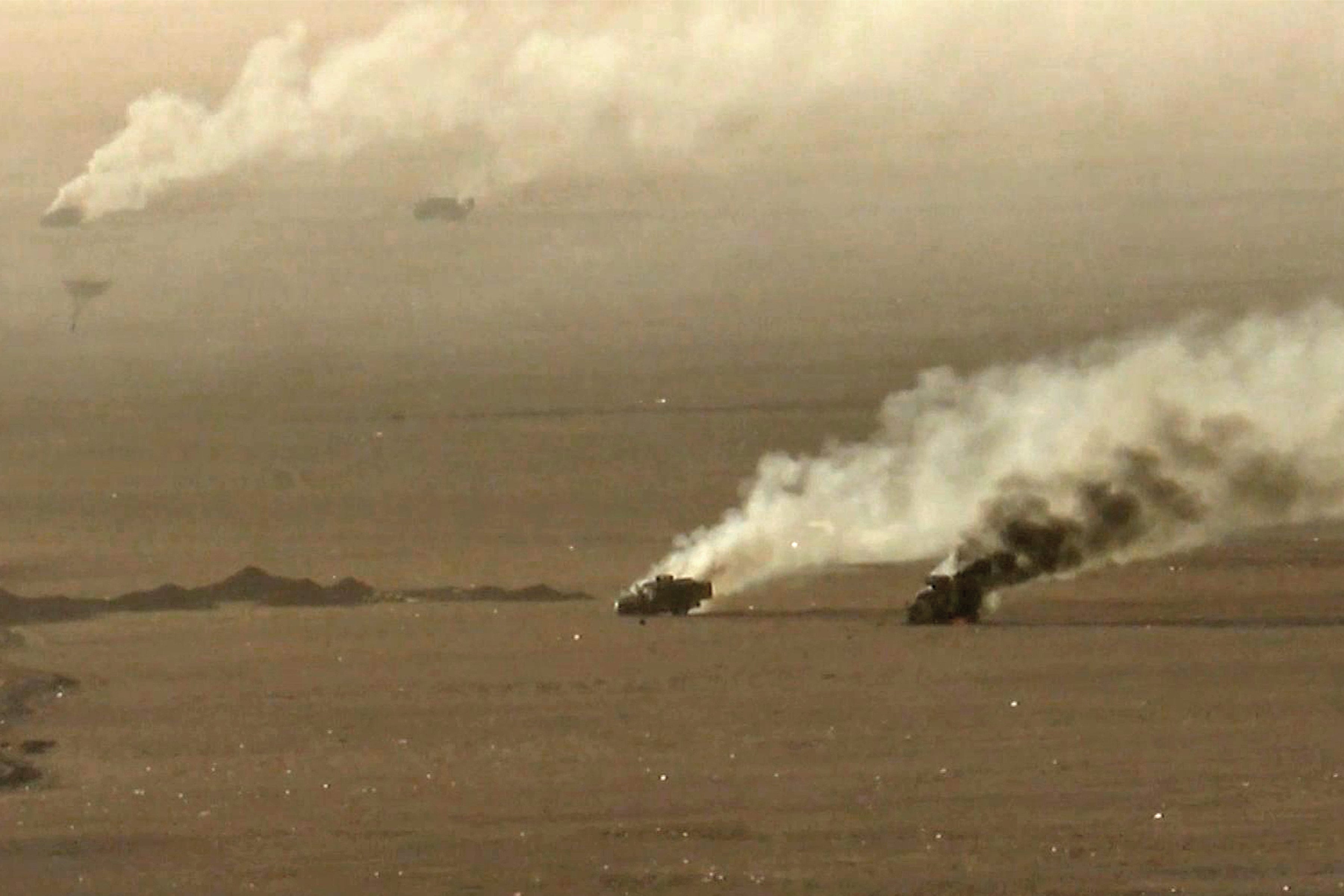 Burning military vehicles during fighting in al-Jawf governate, Yemen. Photo: Ansarullah Media Centre via AFP