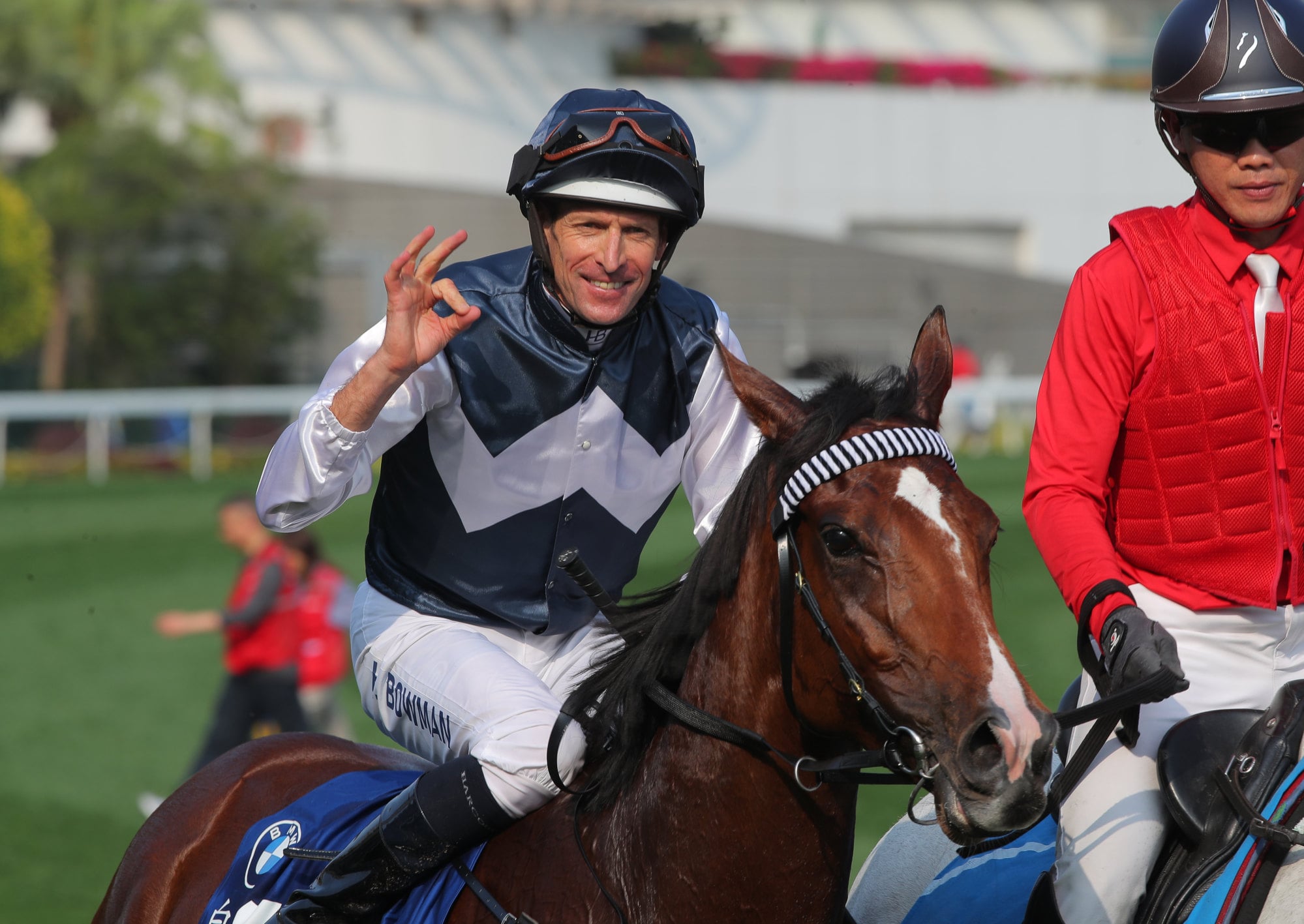 Hugh Bowman with his trademark celebration after winning the Hong Kong Derby on Invincible Ibis. Hugh Bowman with his trademark celebration after winning the Hong Kong Derby on Invincible Ibis.
