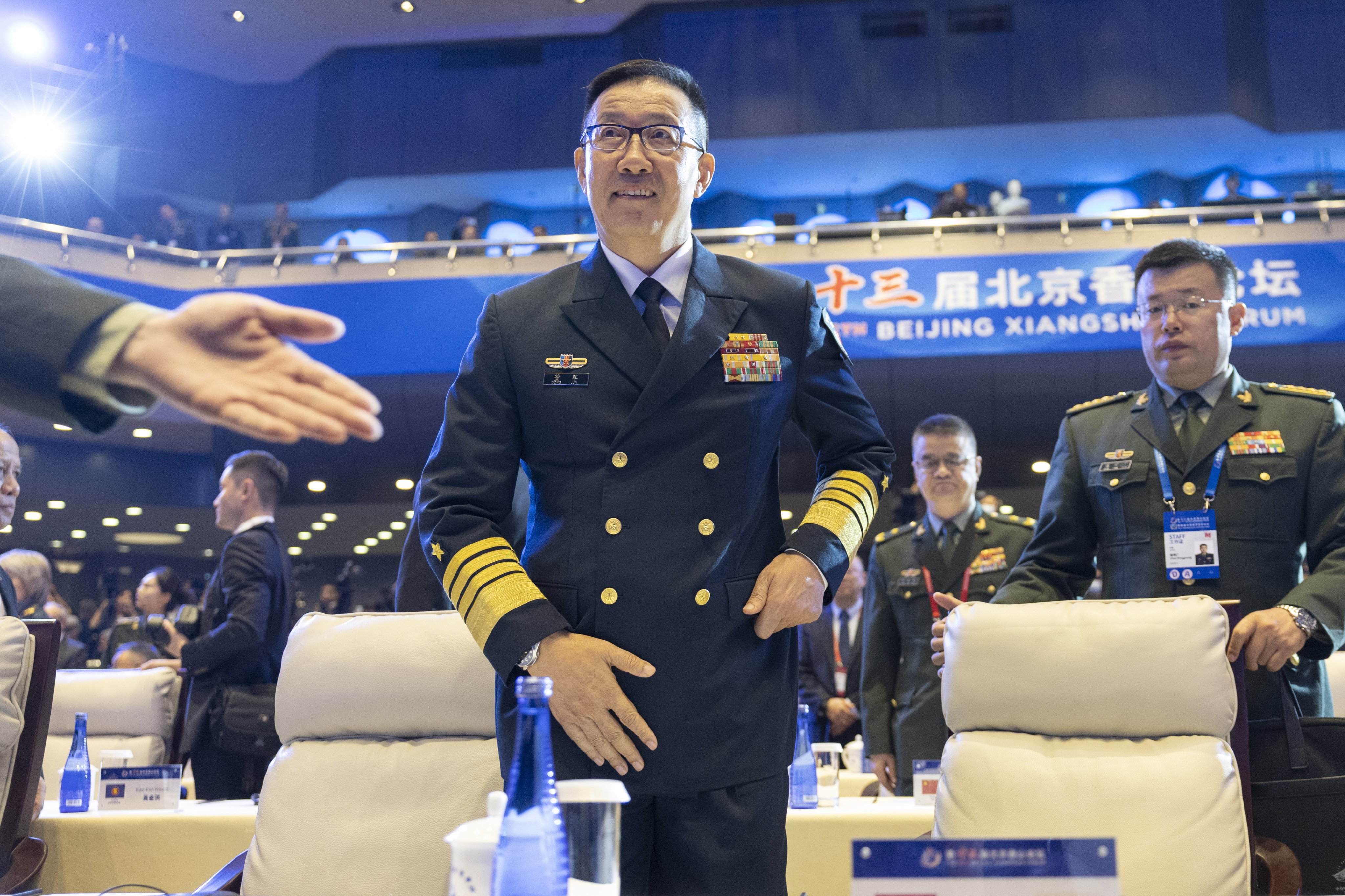 Chinese Defence Minister Dong Jun arrives for the opening ceremony of the Xiangshan Forum in Beijing on Wednesday. Photo: EPA
