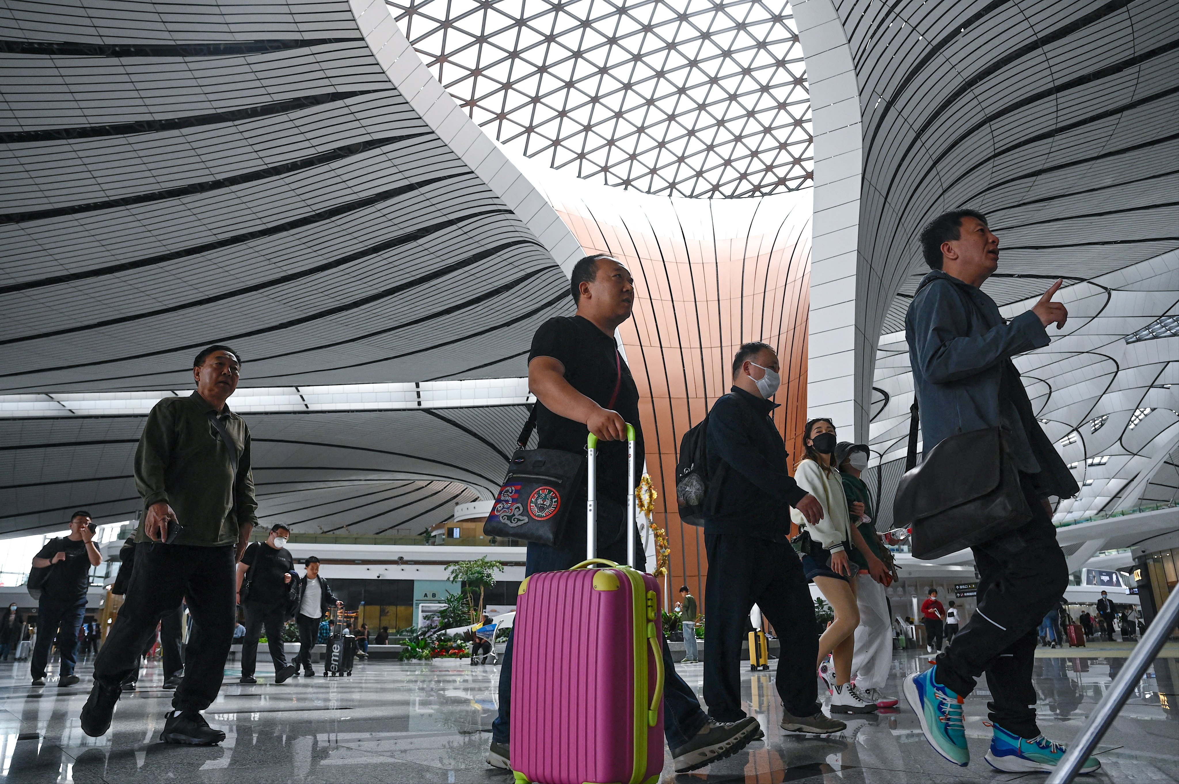 Passengers are seen at Beijing Daxing International Airport in China’s capital. Photo: AFP