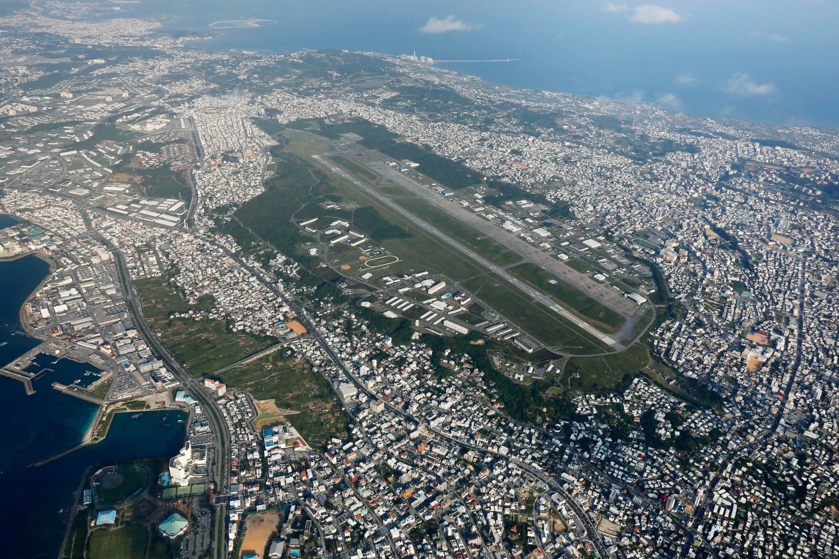US Marine Corps Air Station Futenma in Ginowan, Japan’s Okinawa prefecture, is seen from the air in 2015. Photo: Kyodo/AP