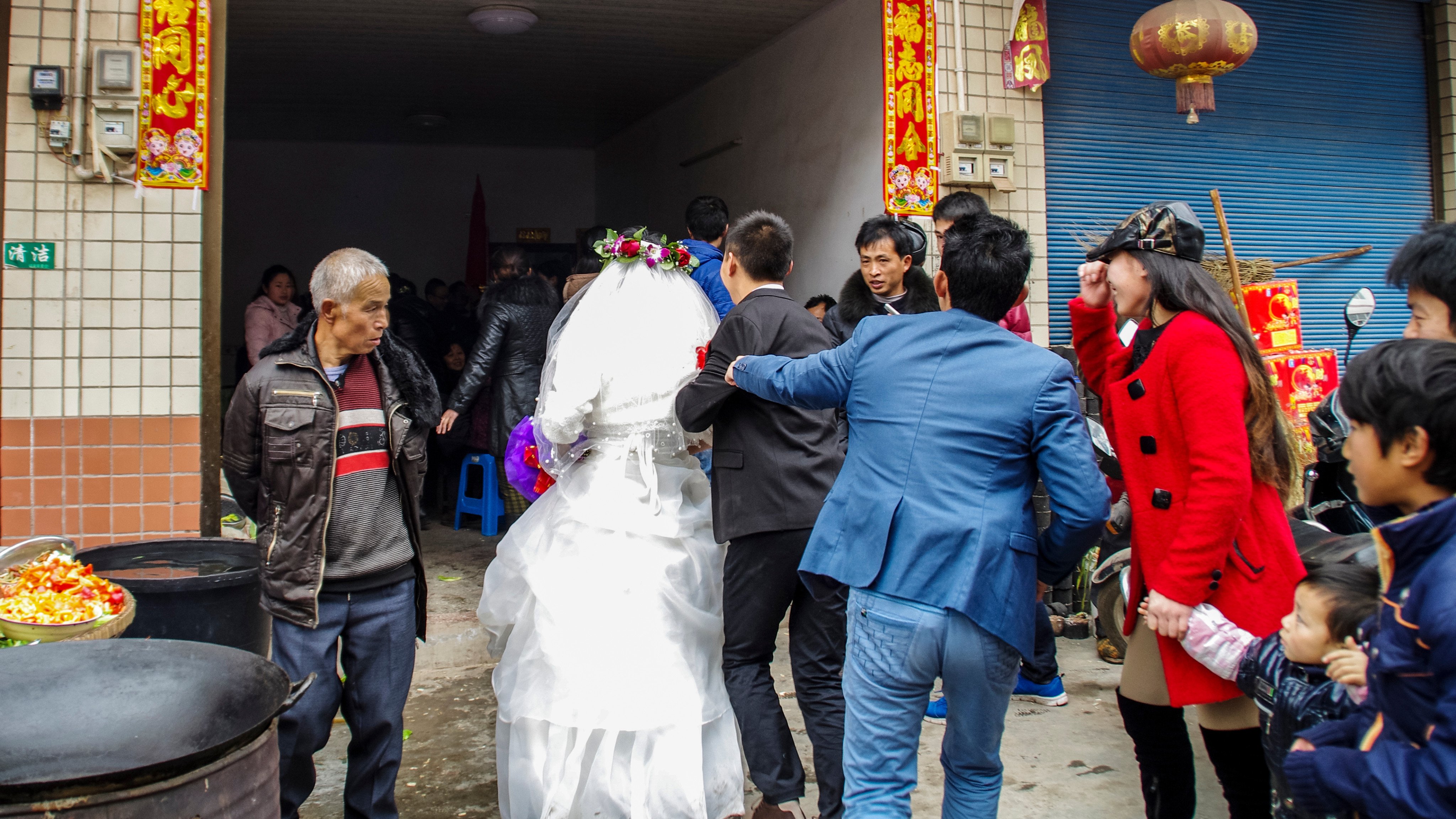 A wedding takes place in Kaizhou city, Chongqing, in 2014. As long as a preference for sons exists, daughters will continue to be seen as good for little more than marrying a man and bearing his children. Photo: Shutterstock