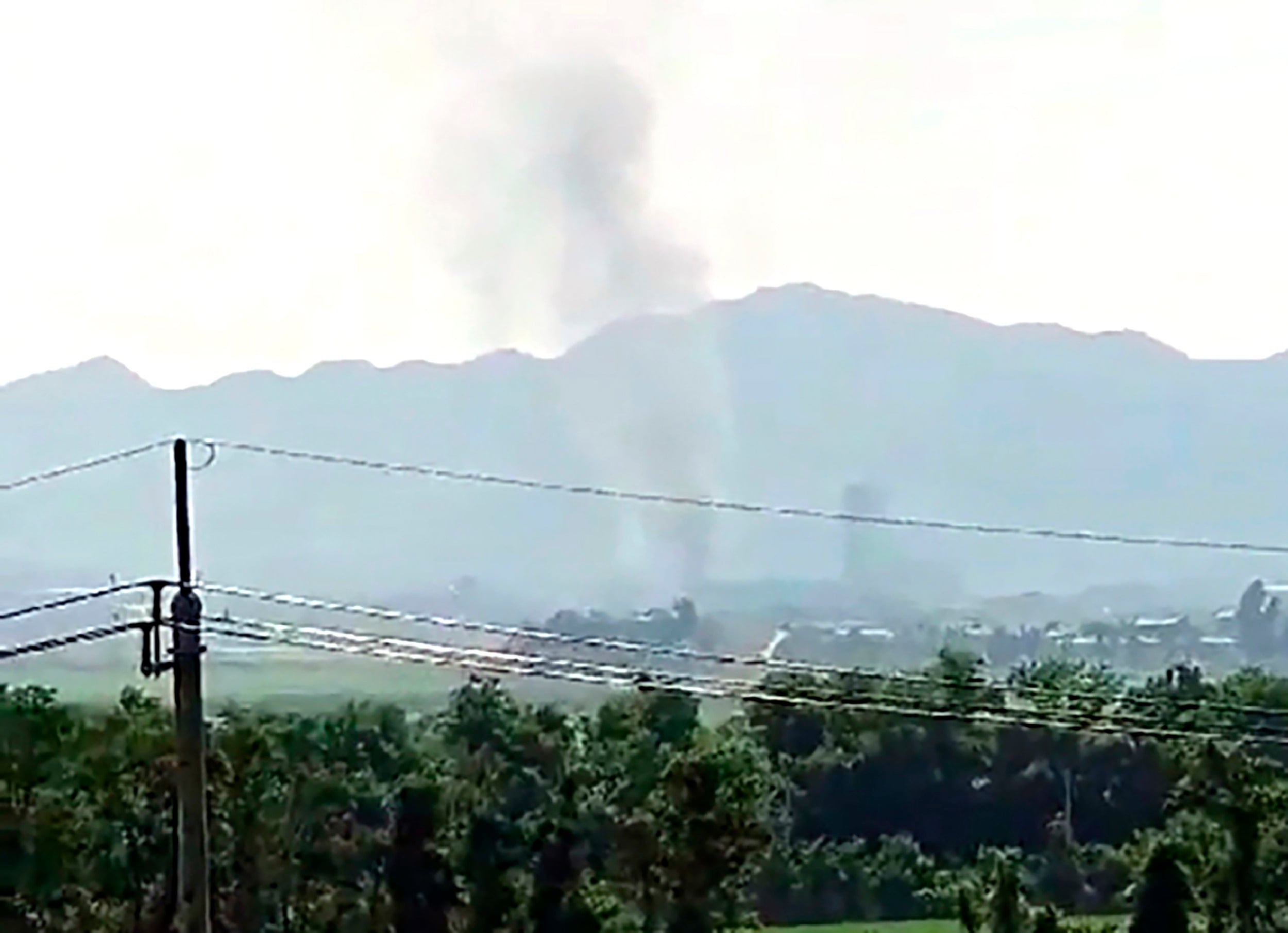 Smoke rises after North Korea blows up the Inter-Korean Liaison Office building in Kaesong on June 16, 2020. Photo: Yonhap / AP