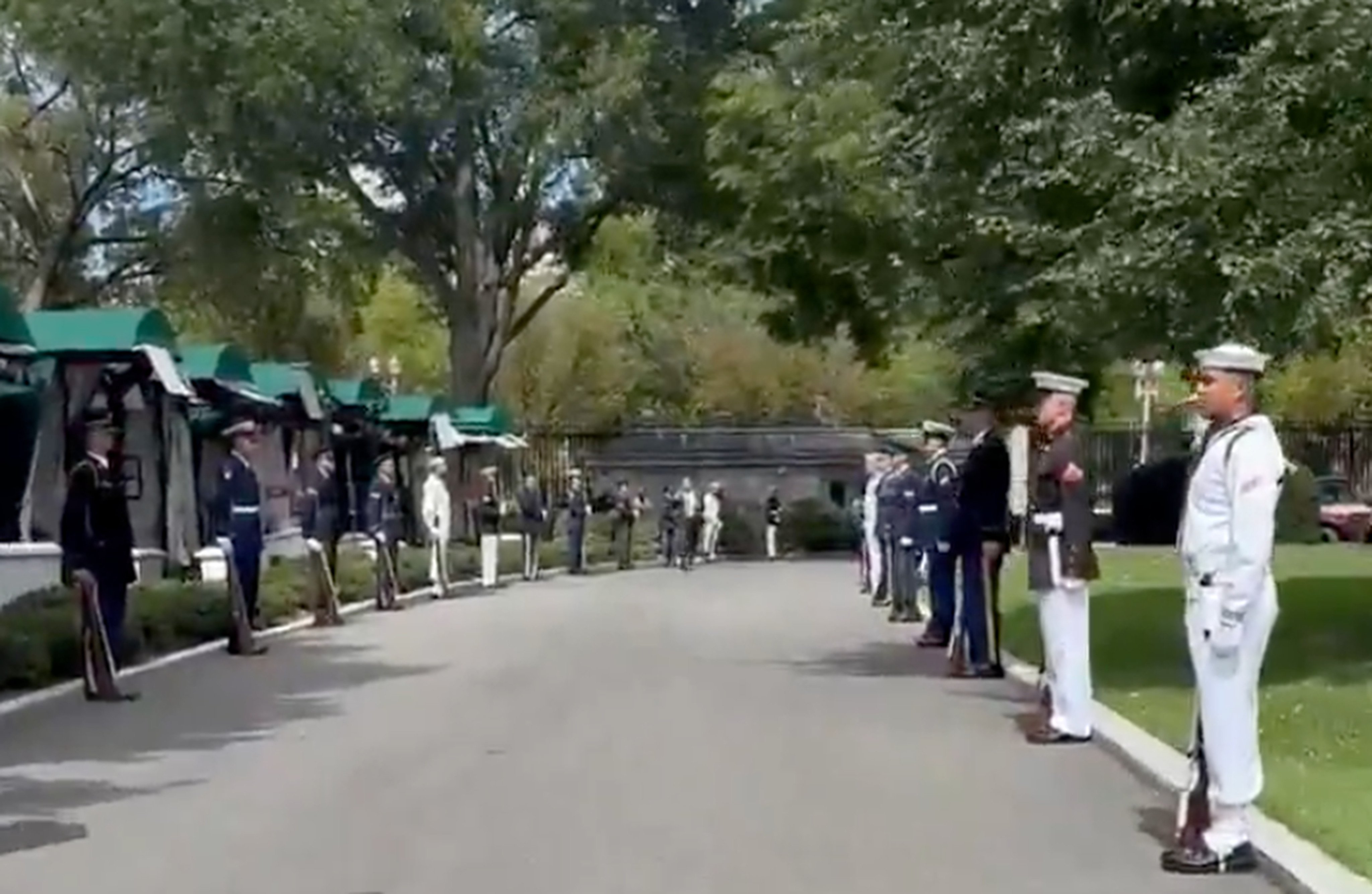 Service members from various US military branches are seen dressed in ceremonial uniform and standing in formation on the White House grounds in a video posted to social media on Tuesday. Photo: X/ @Lucas Tomlinson