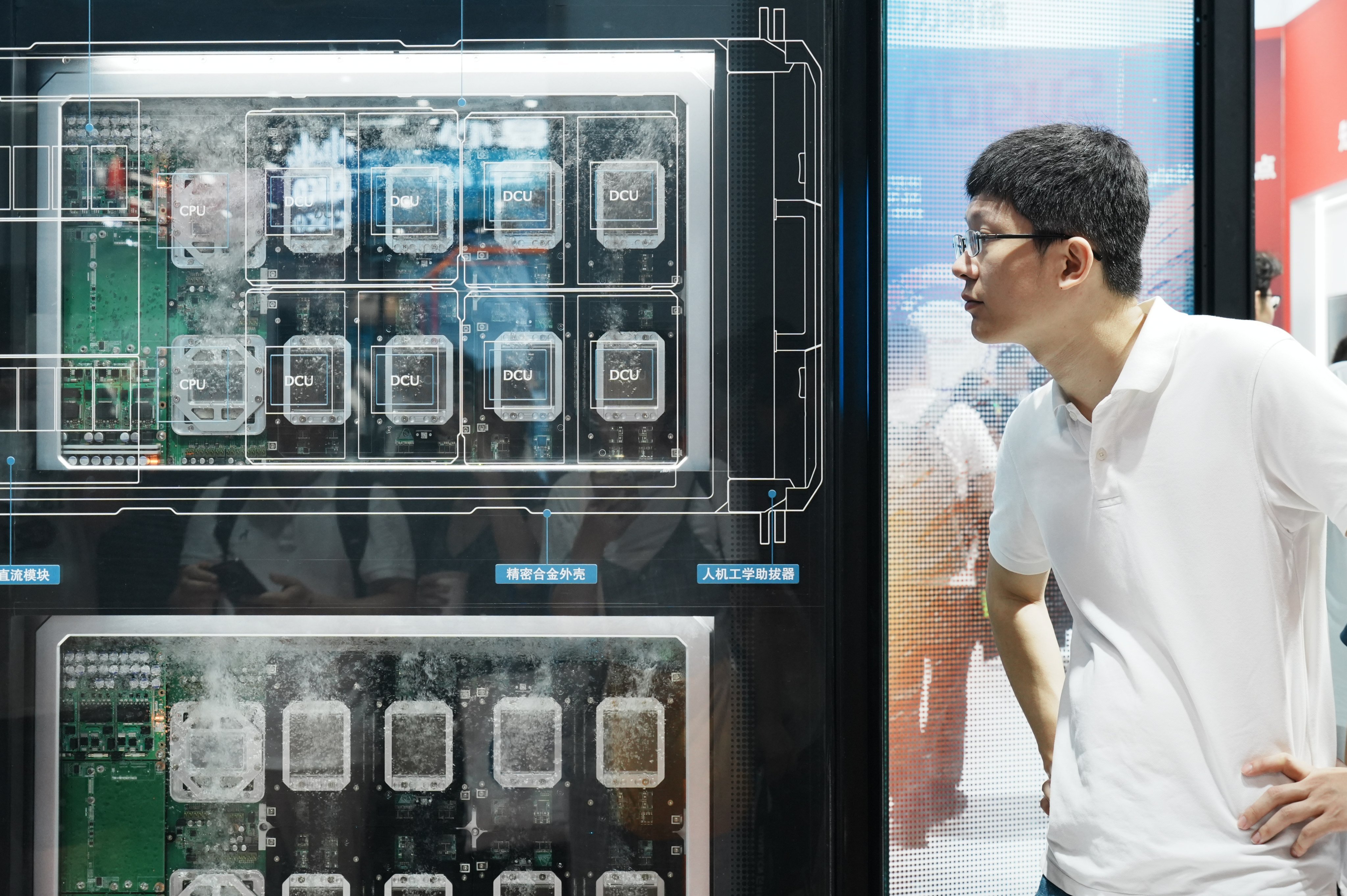 A visitor views China’s 100,000-card AI supercluster Sugon 8000 during the World Artificial Intelligence Conference on July 20 in Shanghai. Photo: VCG via Getty Images