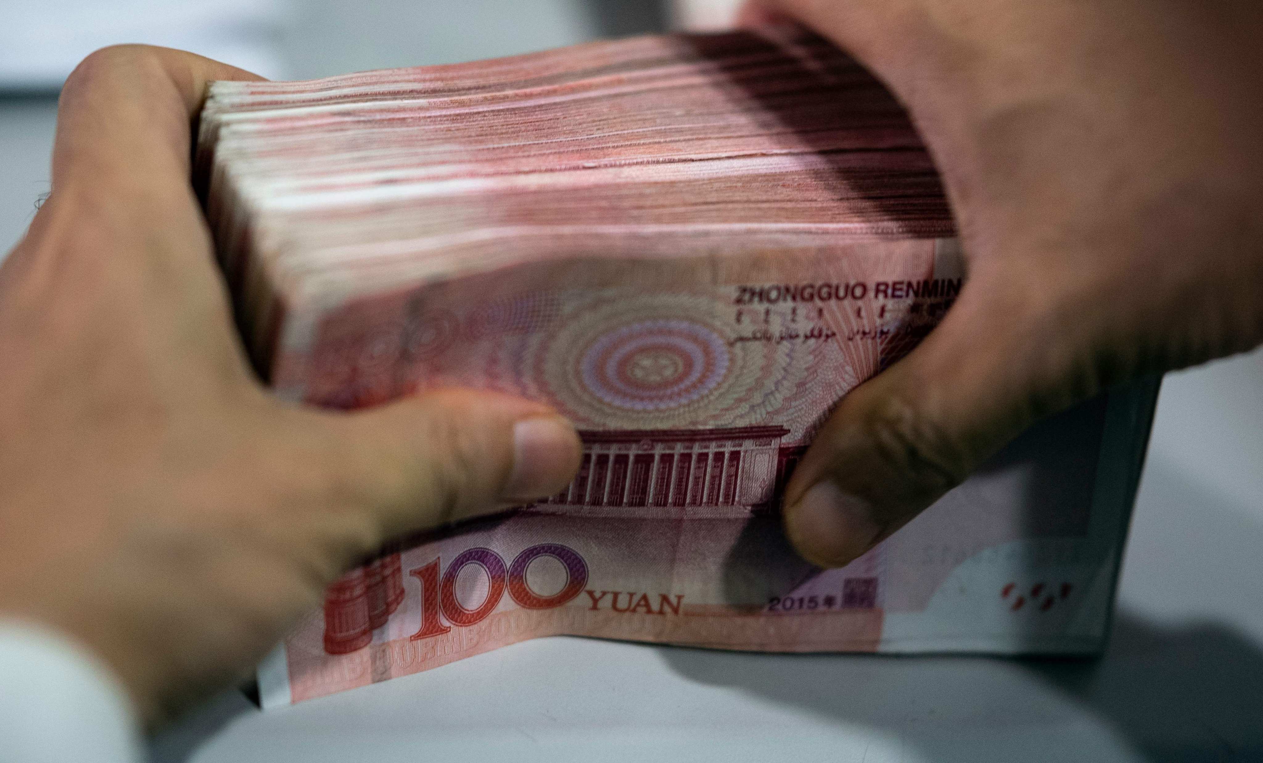 Beijing is stepping up efforts to tackle hidden local government debt and broader financial risks. Photo: AFP