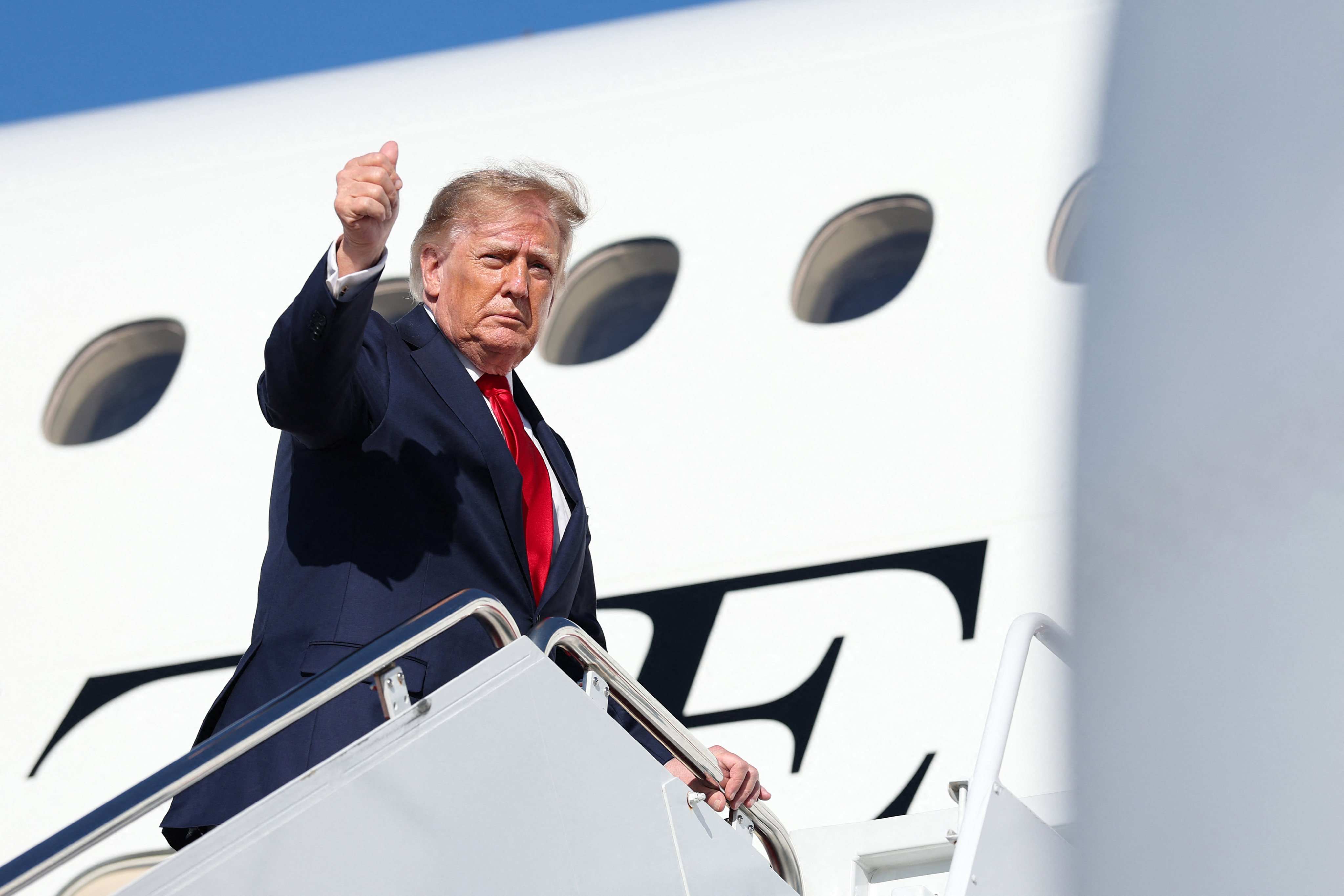 US President Donald Trump boards Air Force One at Joint Base Andrews, Maryland, on Wednesday. Photo: AFP