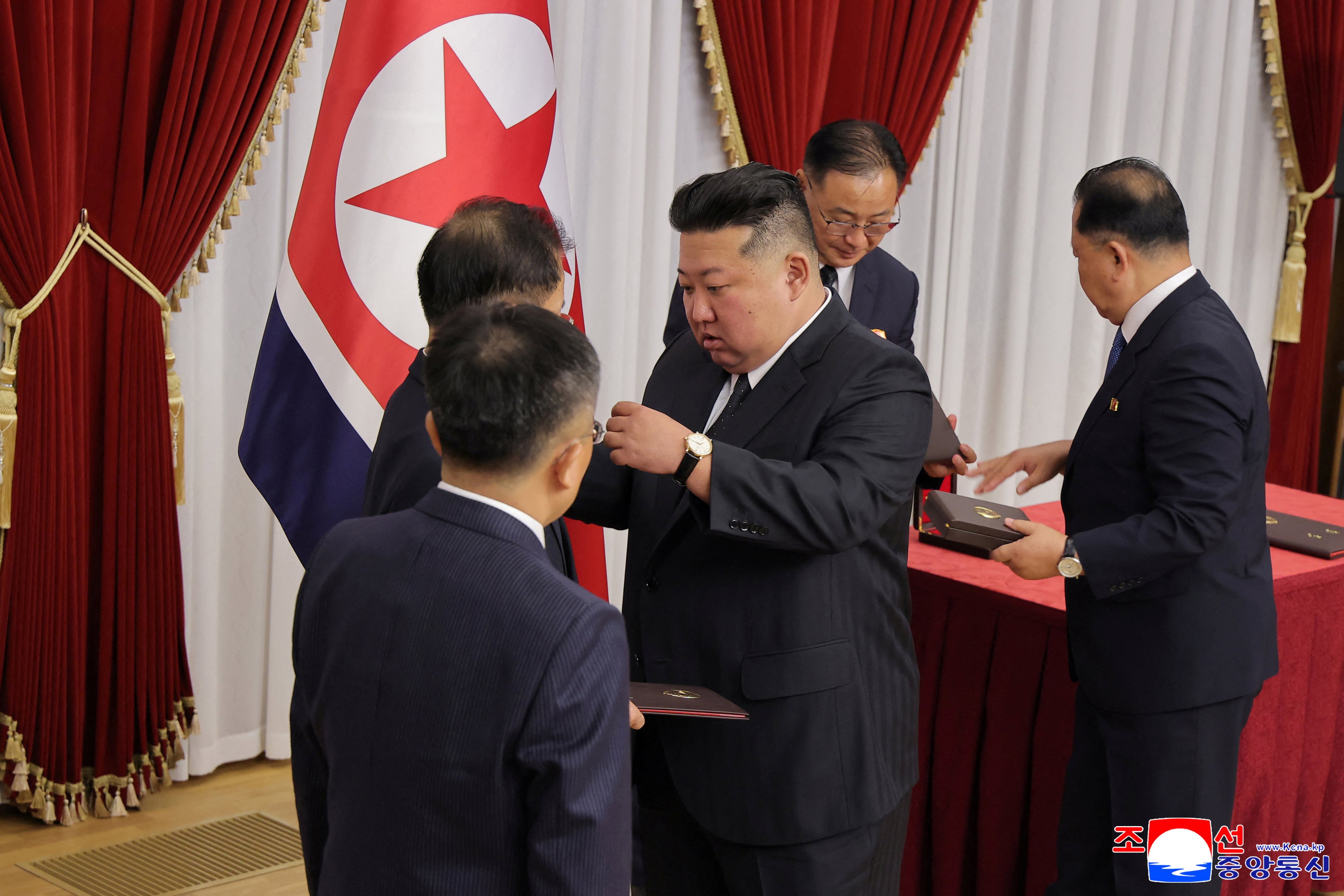 North Korean leader Kim Jong-un (centre) meets scientists, researchers and officials from key national defence research institutions in Pyongyang on August 29. Photo: KCNA / Reuters