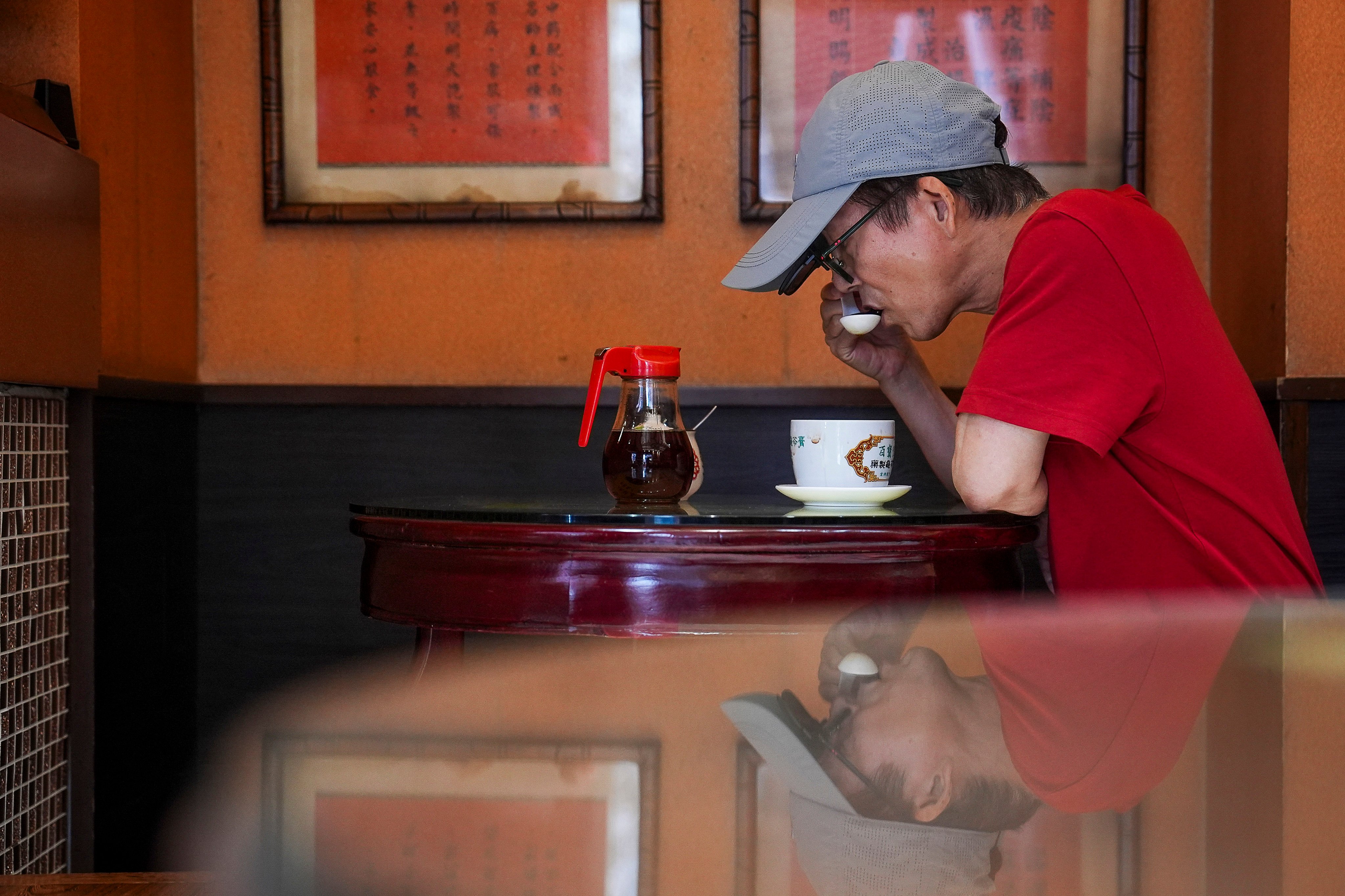 A customer enjoys herbal jelly at Pak Po Tong. Photo: Elson Li