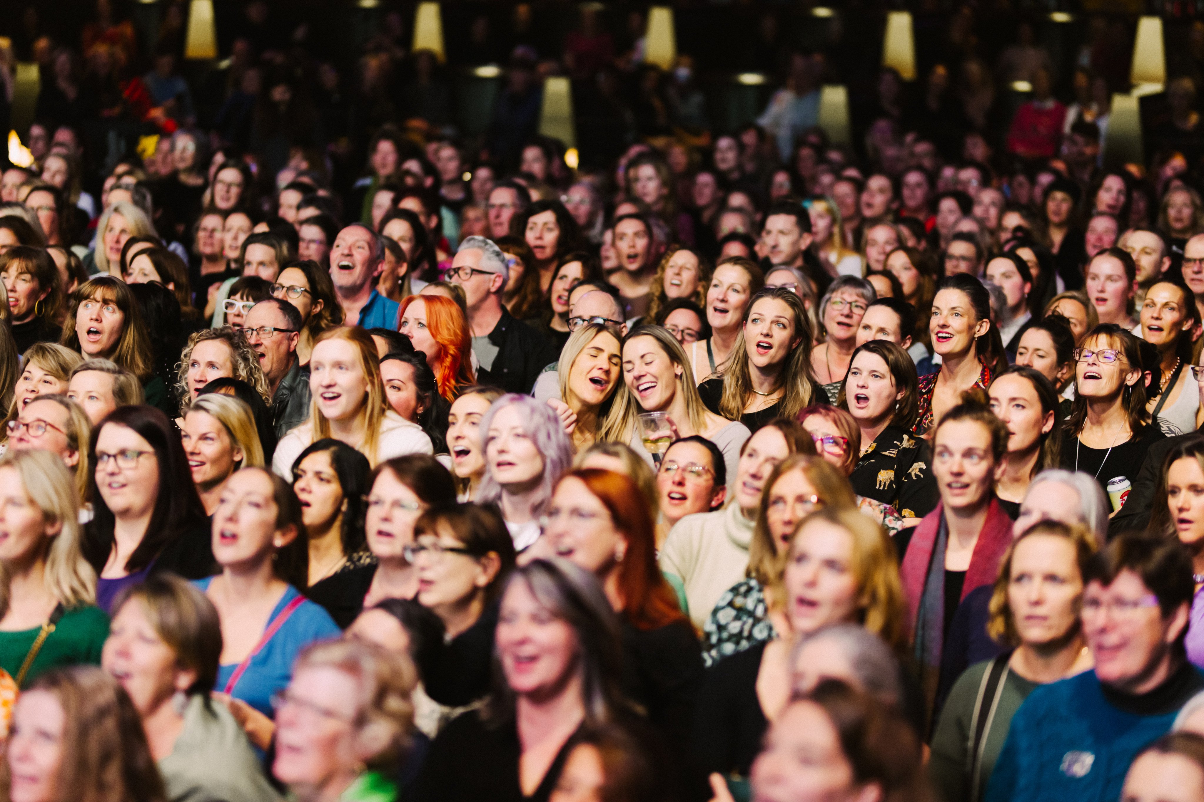 Jorgensen separates her Pub Choir audience members into three different vocal ranges. Photo: Pub Choir