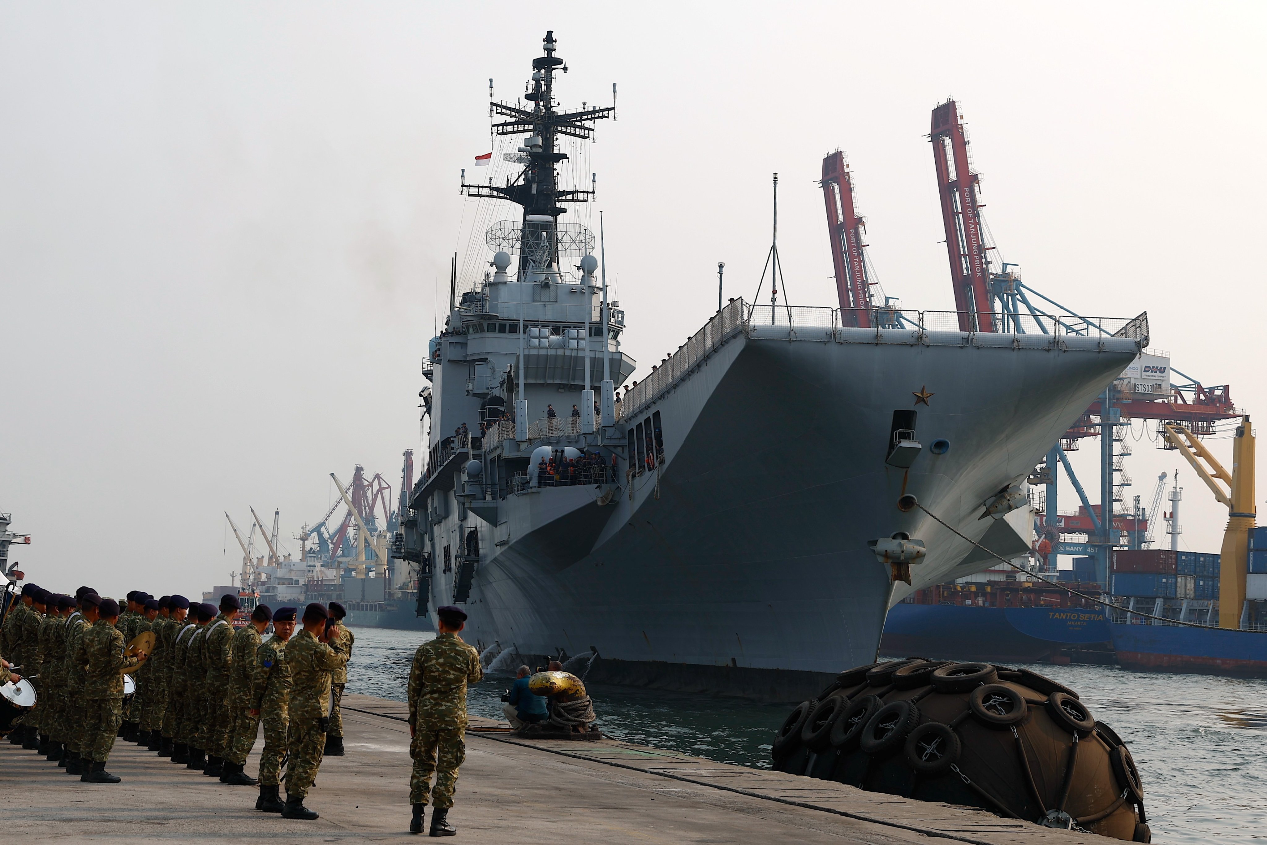 Italian Navy aircraft carrier ITS Giuseppe Garibaldi arrives at Tanjung Priok port in Jakarta on Friday. Photo: EPA