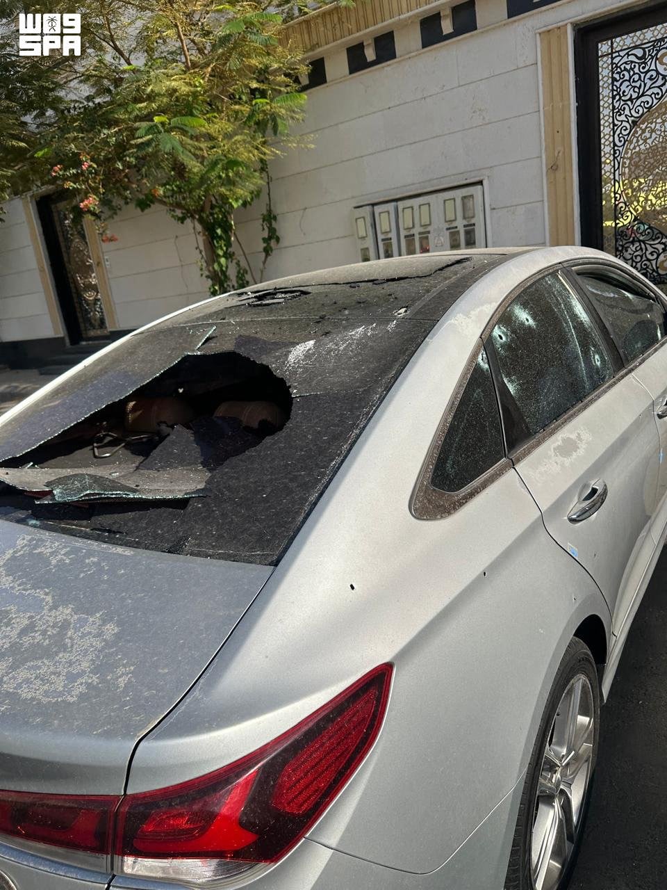 A car is damaged by a reported Houthi drone attack over Taif, Saudi Arabia. Photo: Saudi Press Agency / AFP