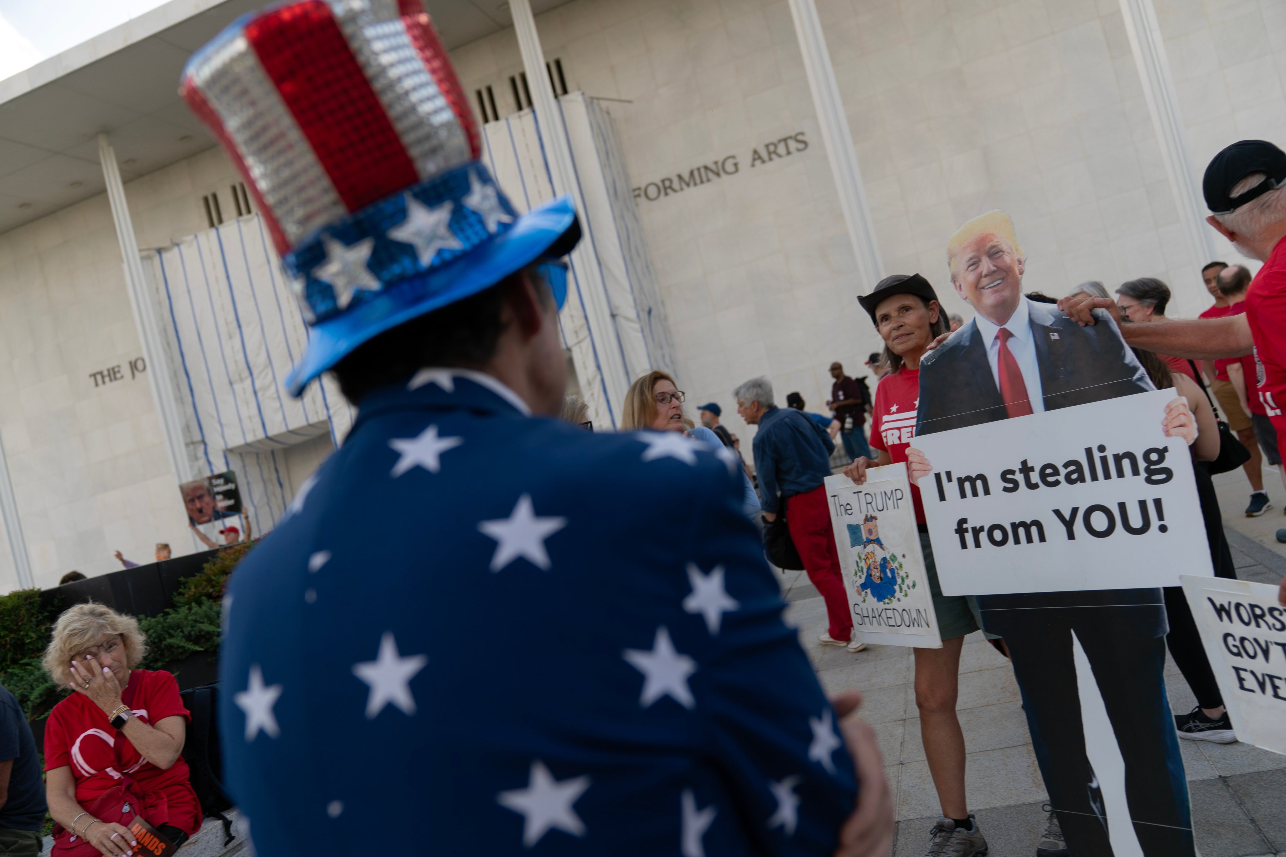 People rally against the closing of the Kennedy Centre for on Friday. Photo: AP