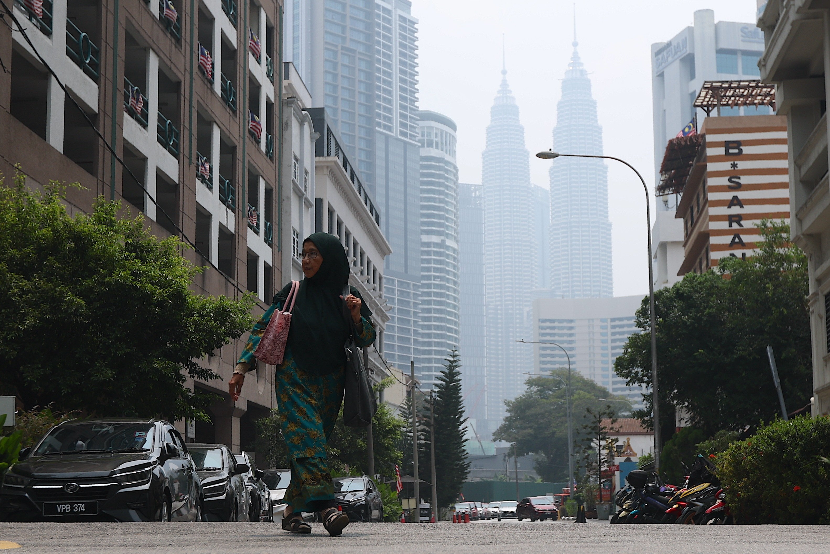 The Kuala Lumpur skyline is obscured as Malaysia’s capital records an unhealthy 192 on the air pollutant index on Tuesday. Photo: EPA