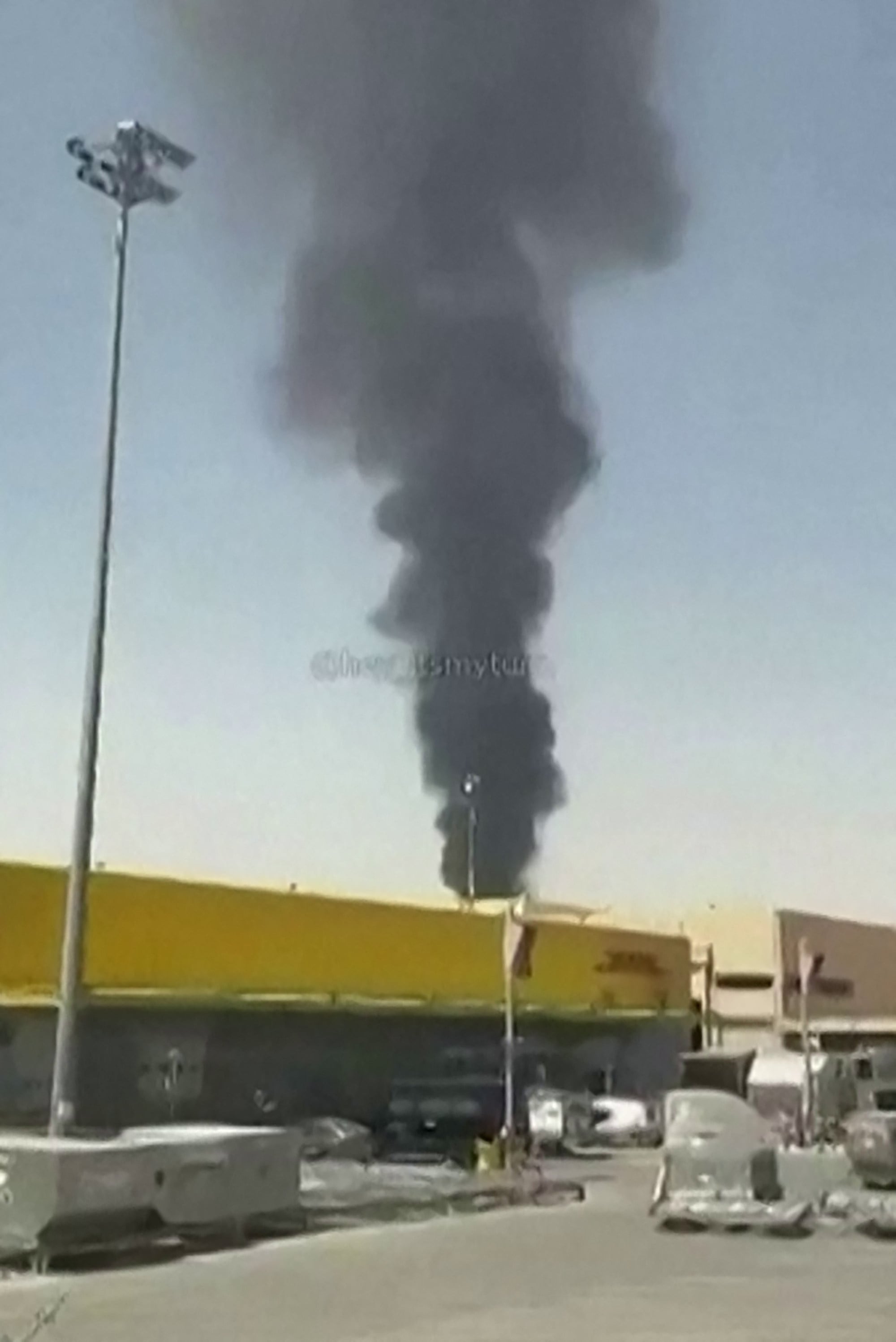 Smoke is seen rising near Riyadh airport on Saturday. Photo: X/hey_itsmyturn via AFP