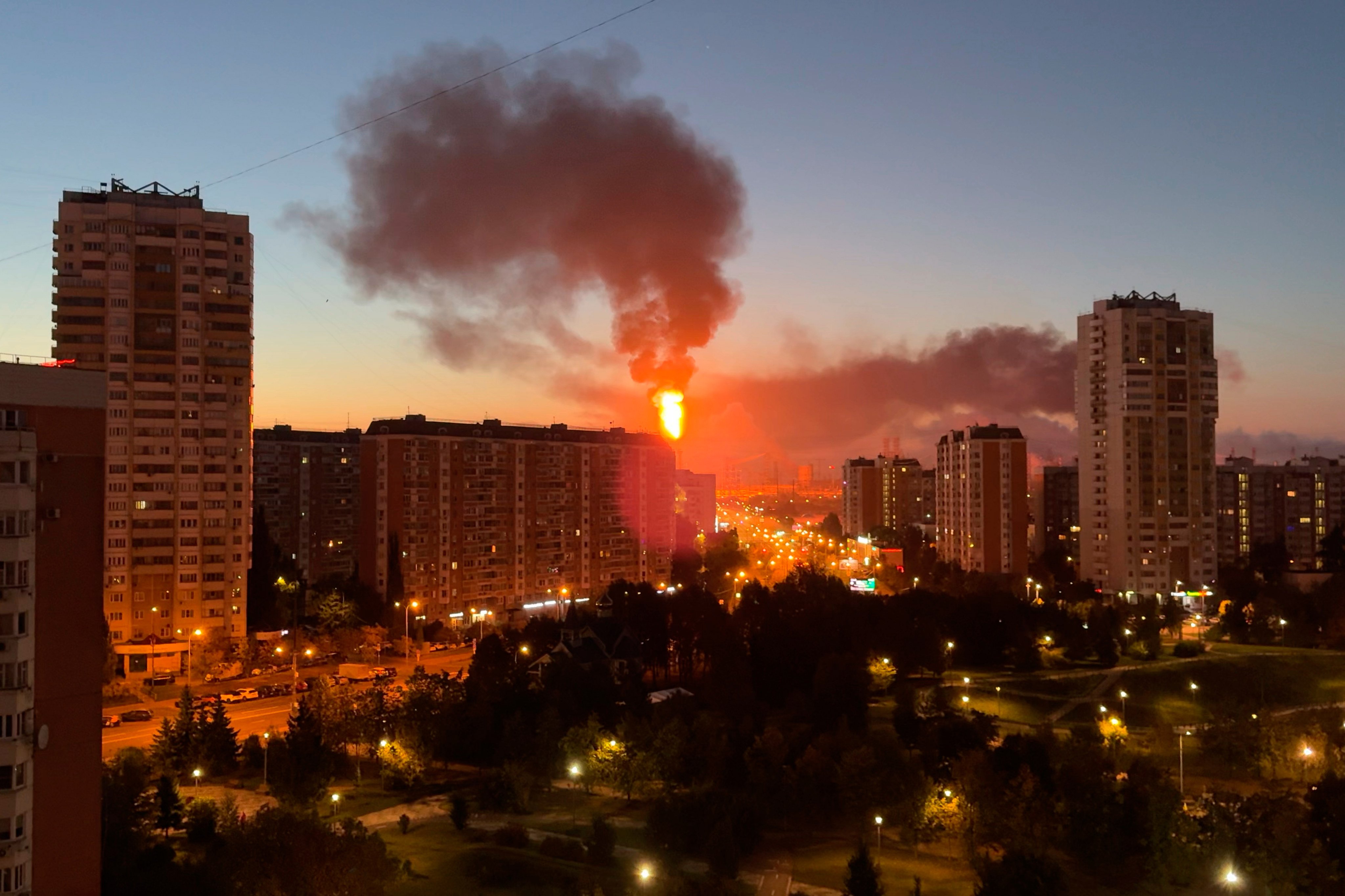 Flames and smoke rise from Moscow’s oil refinery in the south east of the city following a large-scale Ukrainian drone attack on Sunday. Photo: UGC via AP