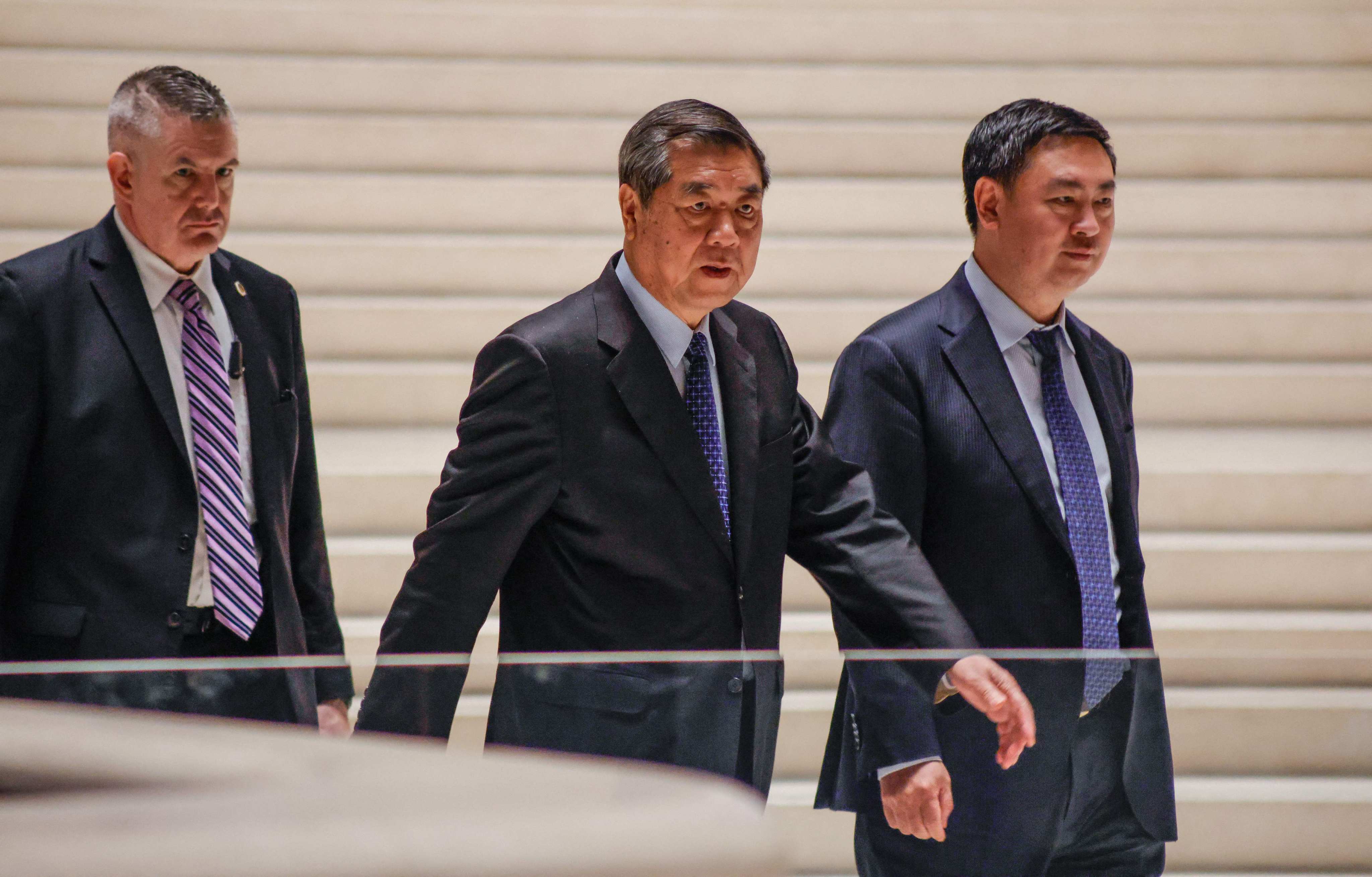 Chinese Vice-Premier He Lifeng (centre) leaves following trade talks with the US in New York. Photo: AFP