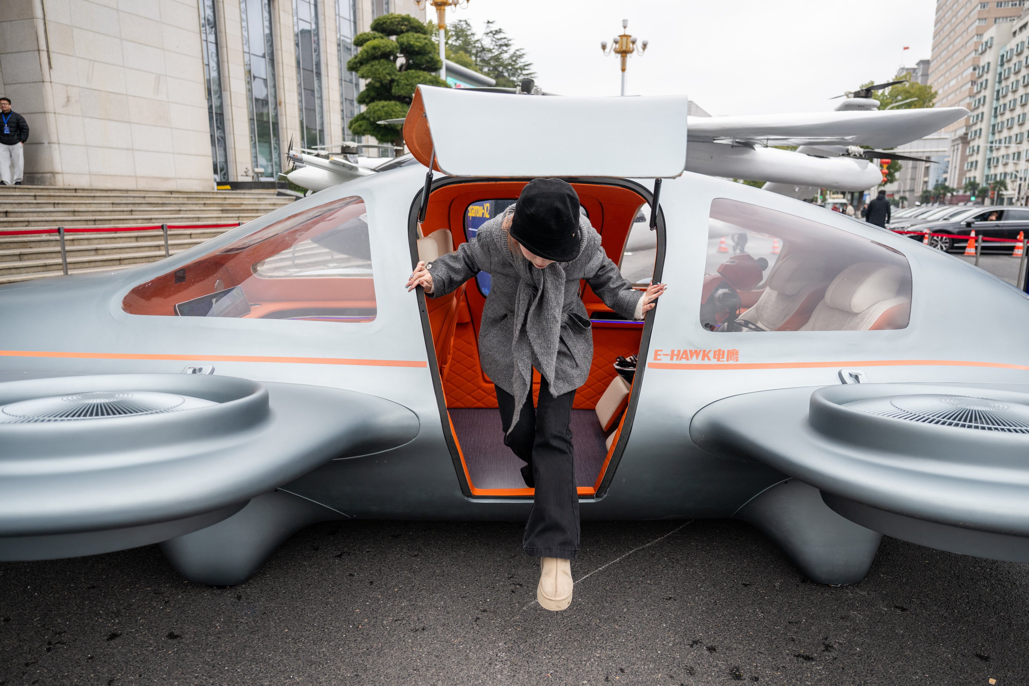 A visitor exits an electric vertical takeoff and landing (eVTOL) aircraft in China’s Hubei province earlier this year. Photo: Xinhua