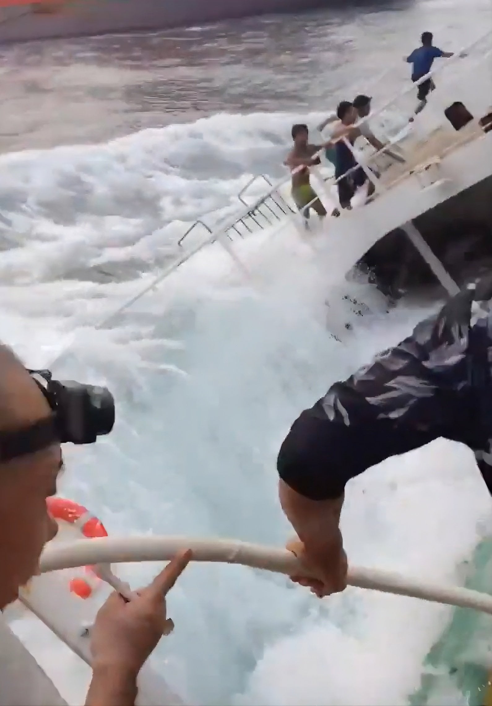 A still from a video filmed from aboard the fishing boat shows water pouring on to the deck after the collision. Photo: X