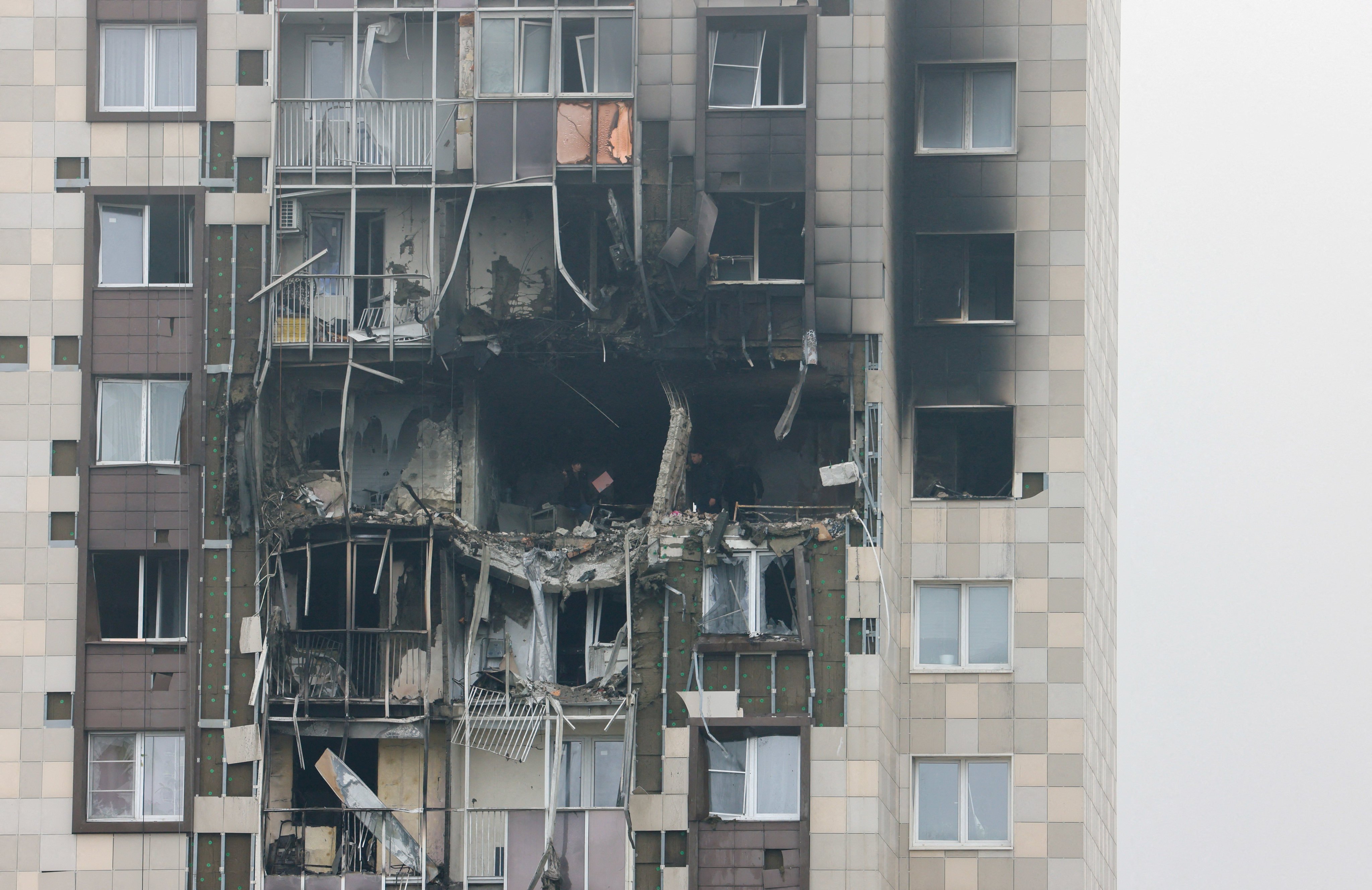 A gaping hole in a multi-storey residential building on the outskirts of Moscow. Photo: Reuters