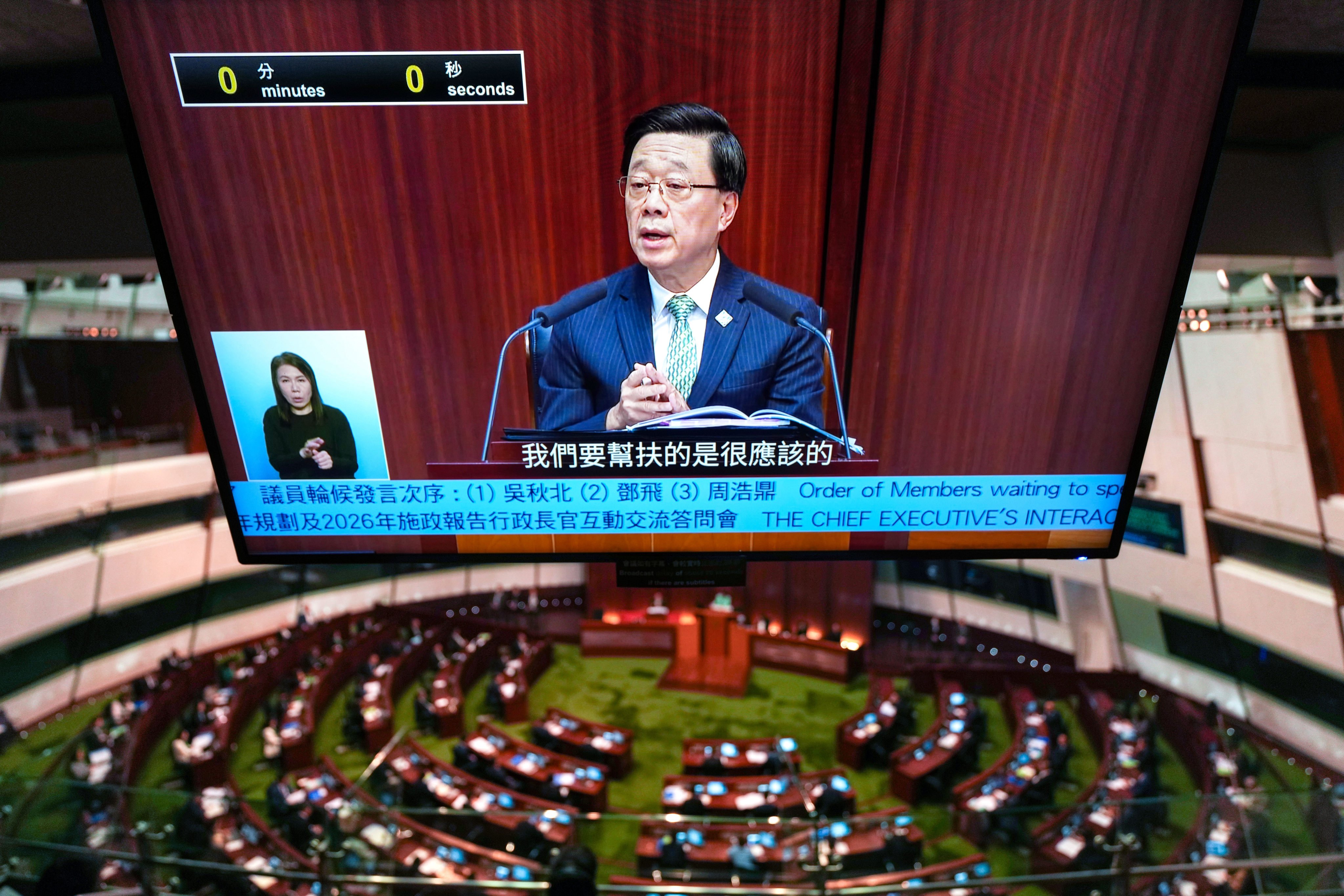 John Lee delivers the policy address in the Legco chamber. Photo: Karma Lo