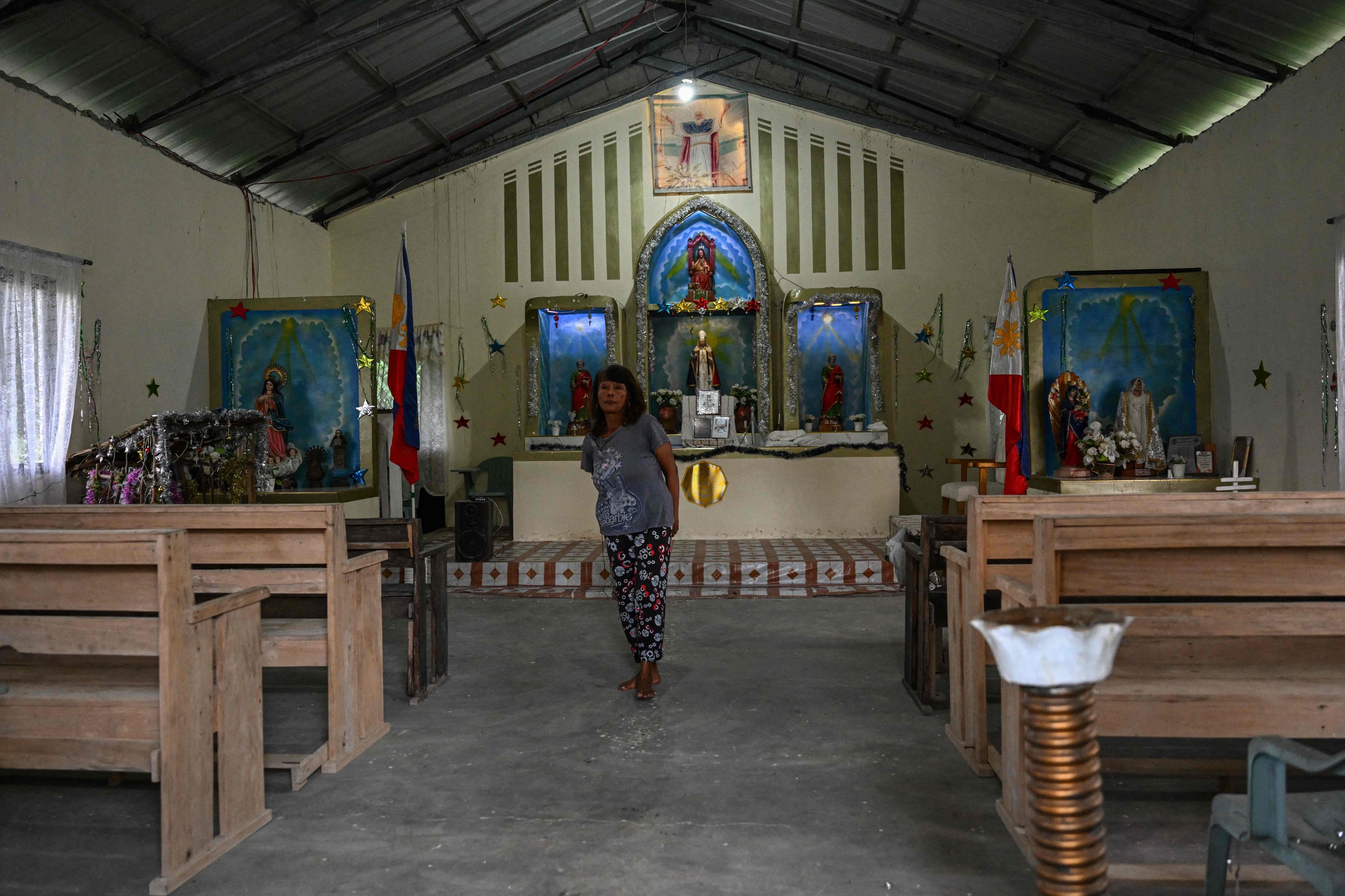 Filipino chieftain Petronila Munoz stands in a church built by her tribe in Capas, Tarlac province, on September 2. Photo: AFP