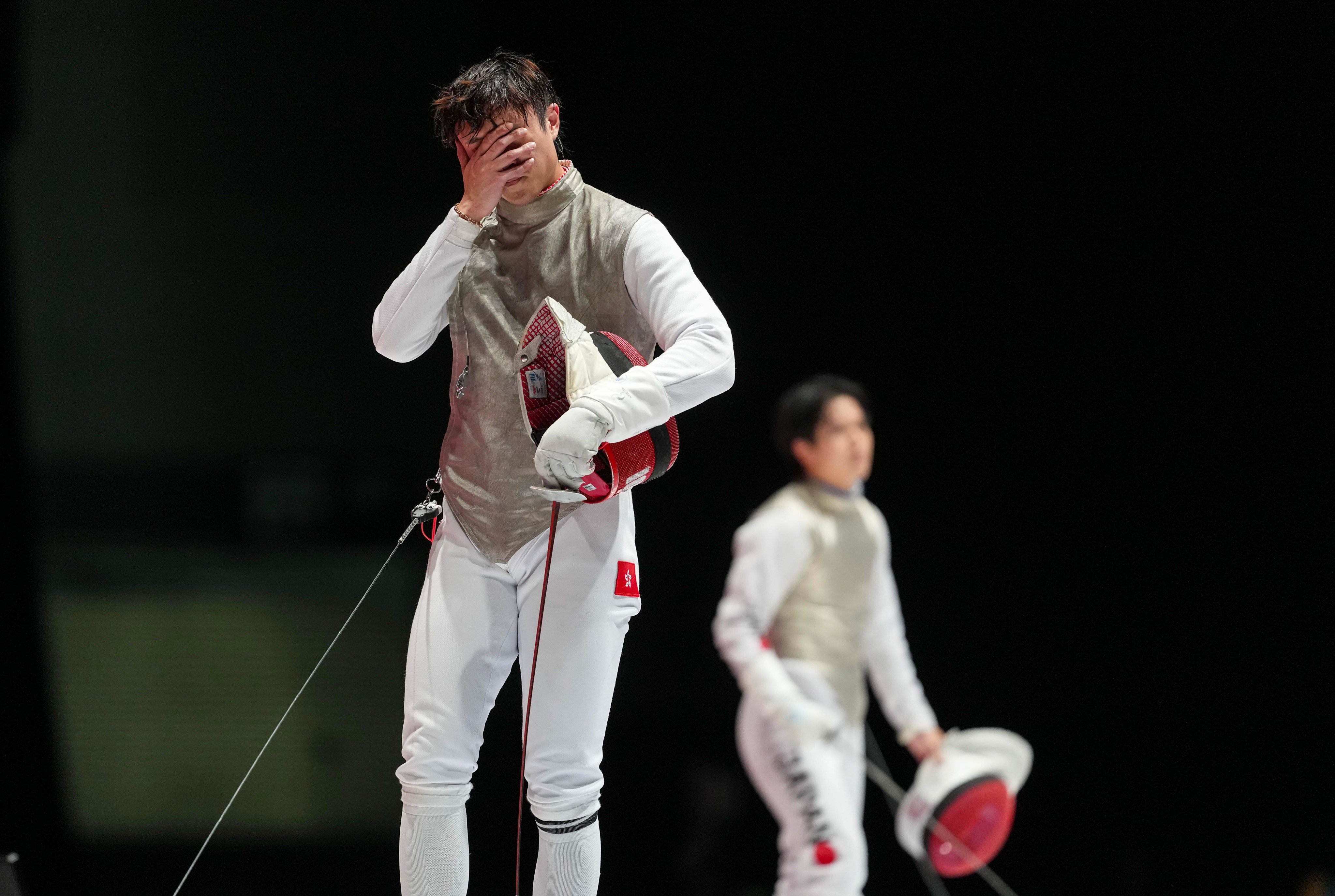 Ryan Choi reacts after his heartbreaking loss to Japan’s Kazuki Iimura in the final of the men’s individual foil. Photo: Sam Tsang
