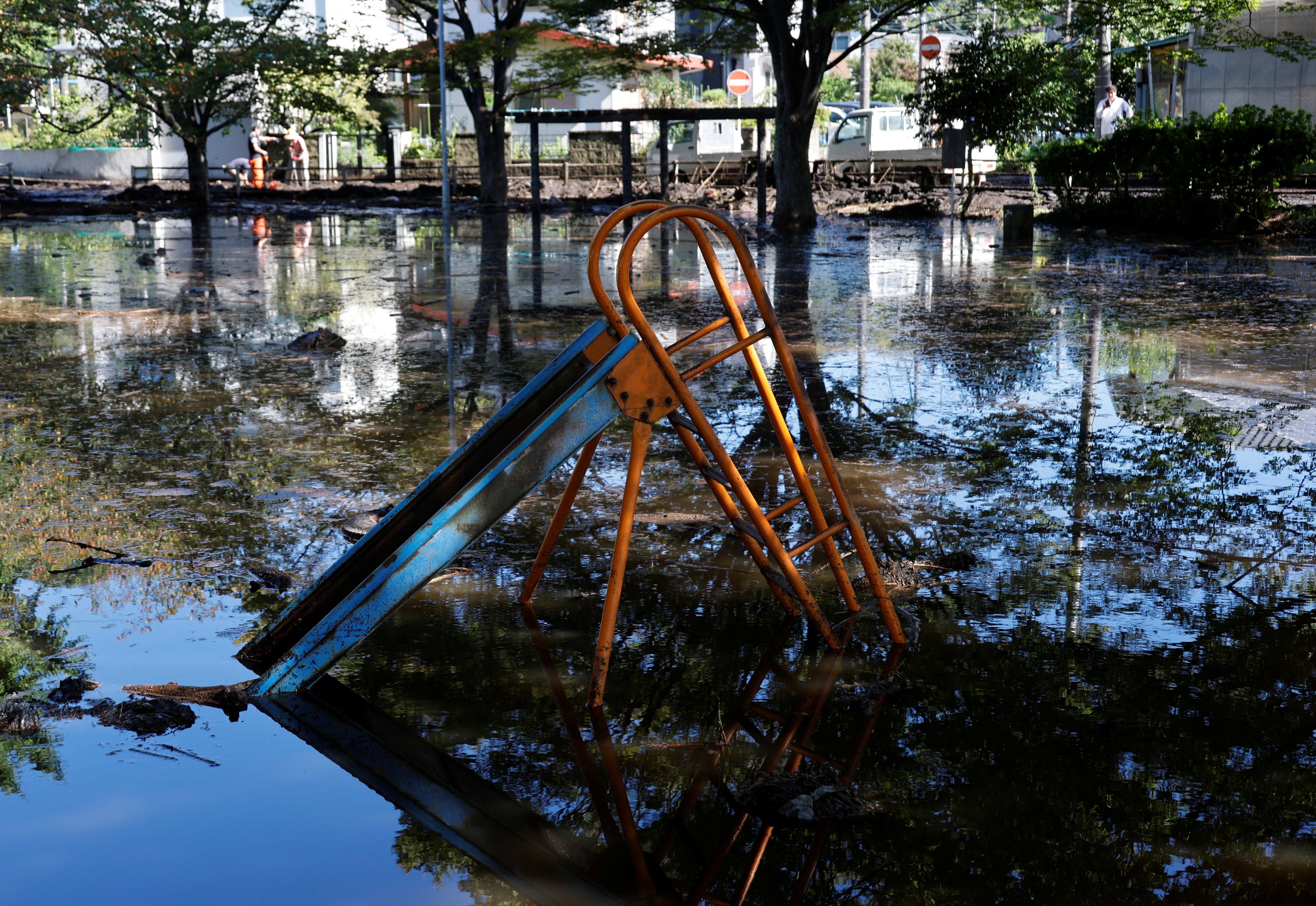 Floodwater covers a children’s playground in Miura, Kanagawa prefecture, on Tuesday after Typhoon Dujuan. Photo: Reuters