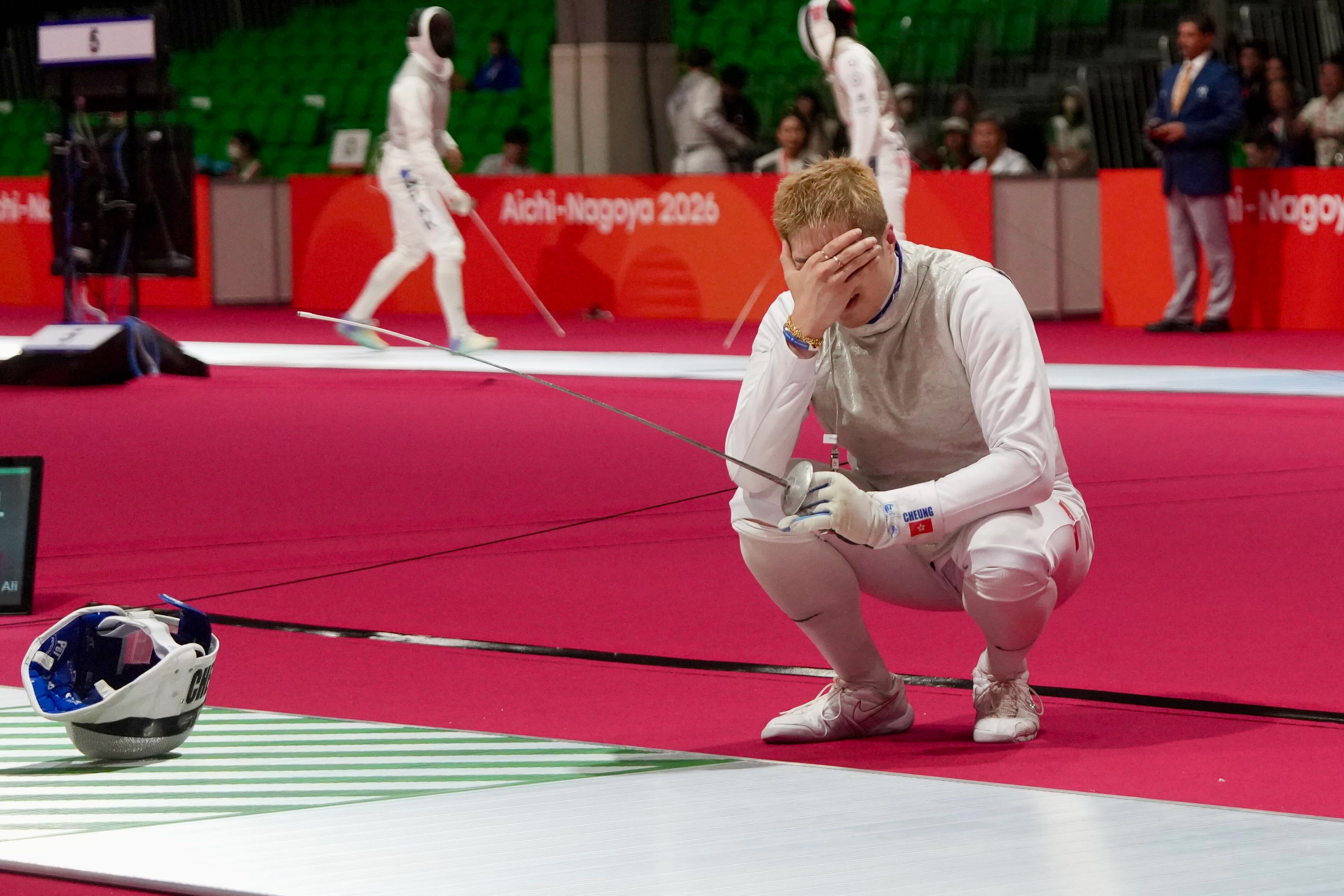 Cheung Ka-long reacts after losing to Qatar’s Ali Owaida in the pool stage of the men’s individual foil competition. Photo: Sam Tsang