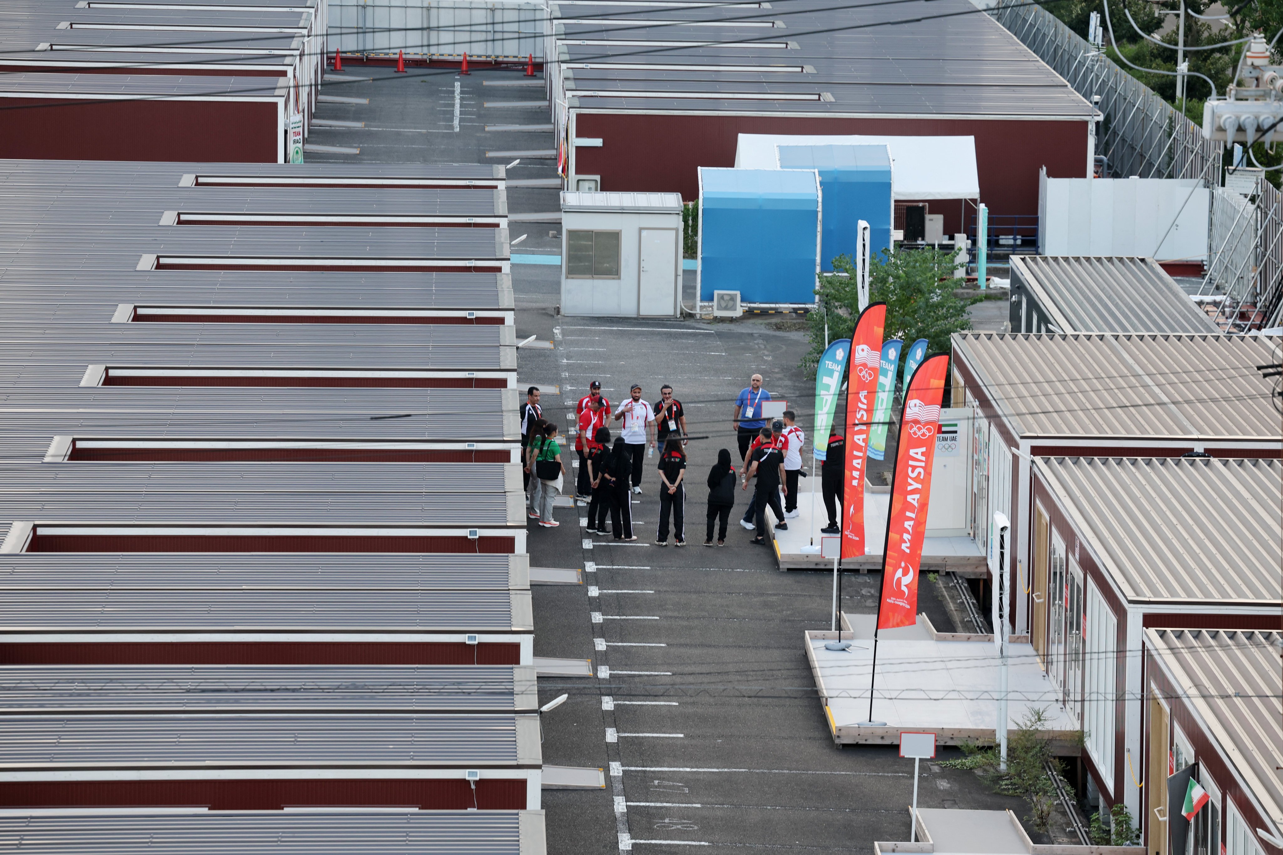 Asian Games competitors have been housed in wooden container units as part of the mix of accommodation that make up the "athletes’ village". Photo: Reuters