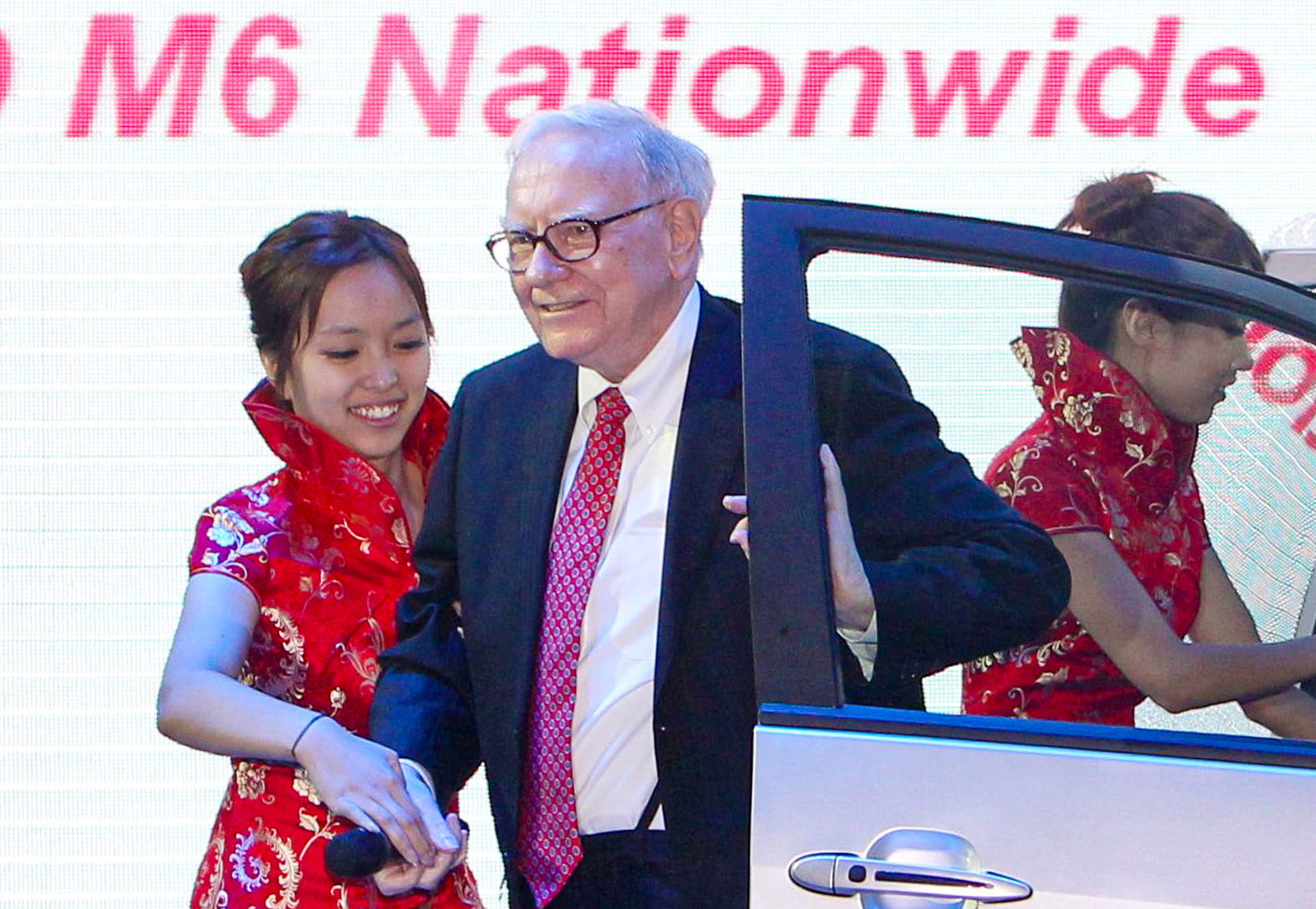 In this 2010 image, Warren Buffett is seen at a BYD product-launch conference in Beijing, two years after the company he founded, Berkshire Hathaway, invested in the Chinese automaker. Photo: Getty Images