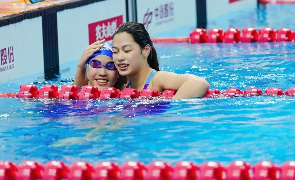 Yu Yiting (right) after beating Yu Zidi (left) in the 200m individual medley final at the China National Swimming Championships in June. Photo: Handout