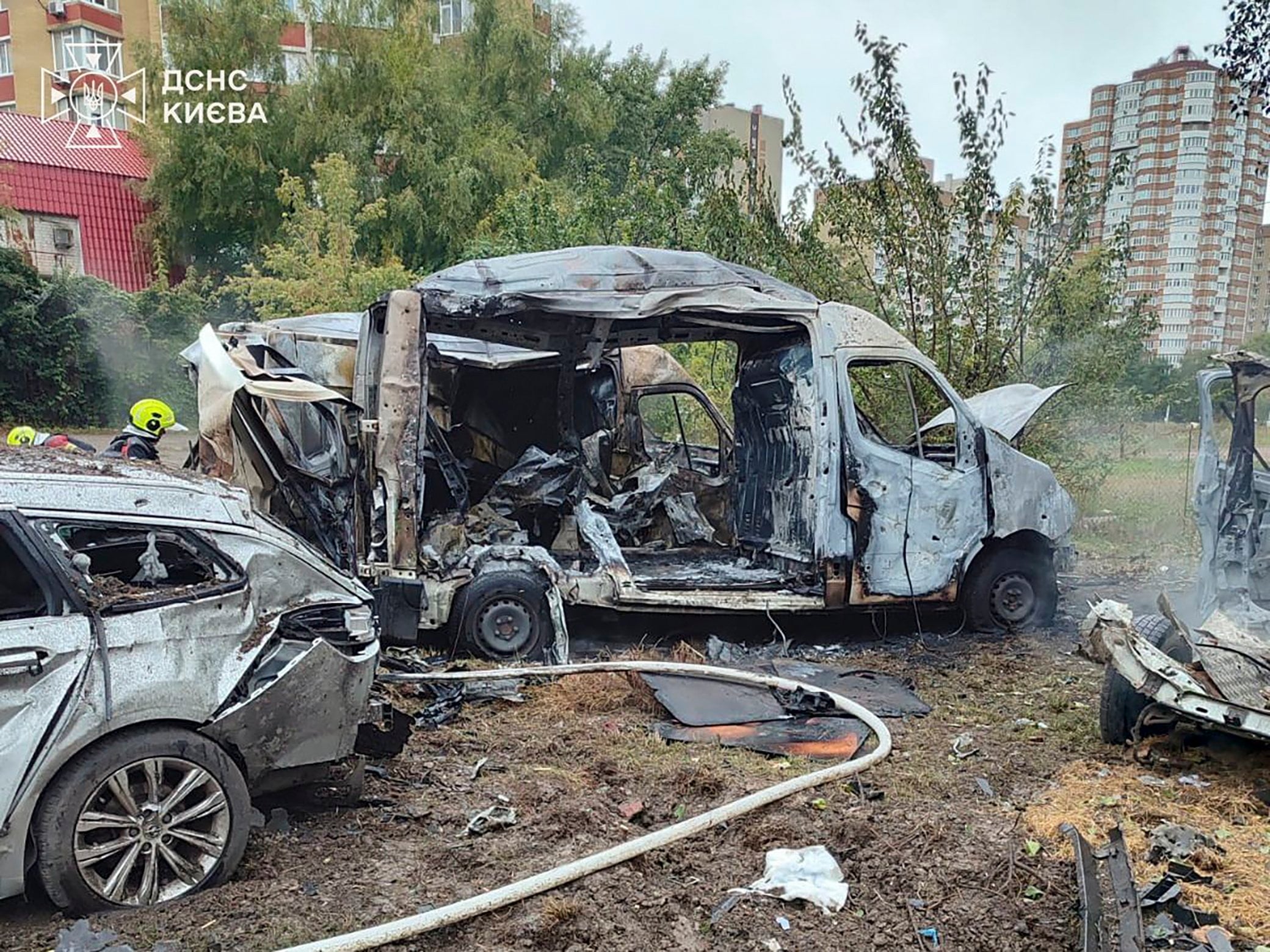 Ukrainian rescuers working at the site of an overnight Russian attack on a residential area in Kyiv, Ukraine, on Thursday. Photo: EPA/State Emergency Service
