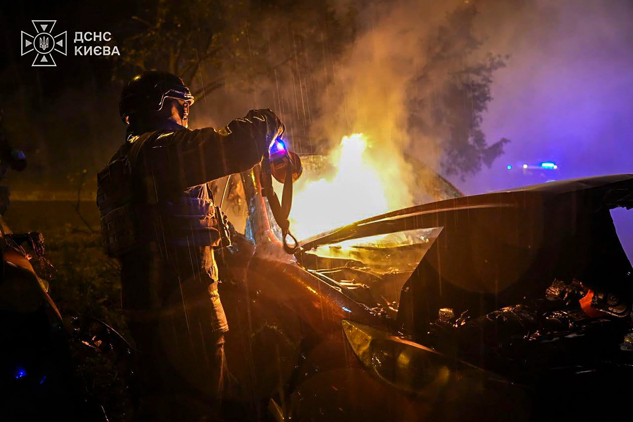 A Ukrainian rescuer working at the site of an overnight Russian attack on a residential area in Kyiv, Ukraine, on Thursday. Photo: EPA/State Emergency Service