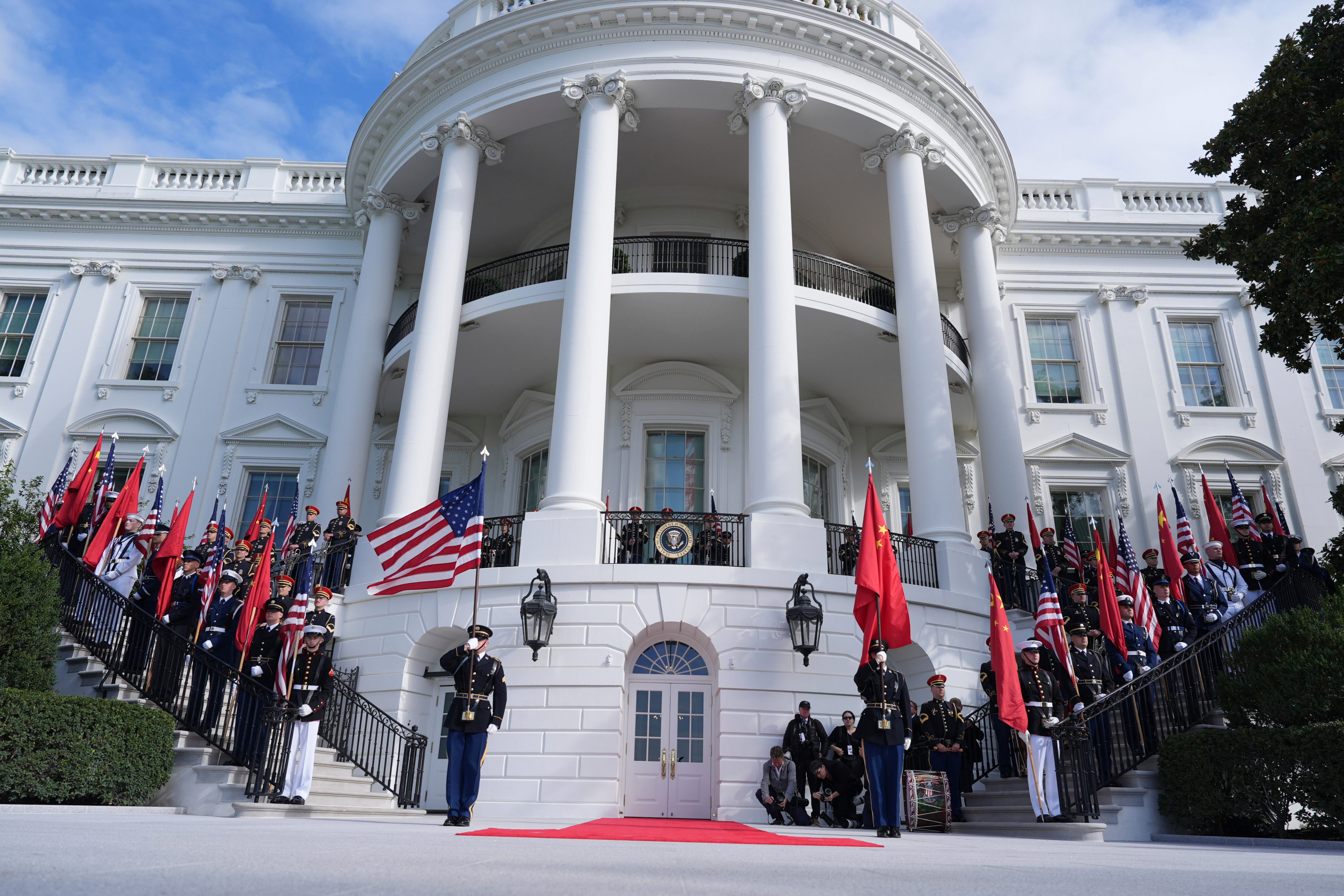 Members of the military and press are pictured before US President Donald Trump and first lady Melania Trump greet China’s President Xi Jinping and his wife Peng Liyuan on the South Portico of the White House on Thursday. Photo: AP