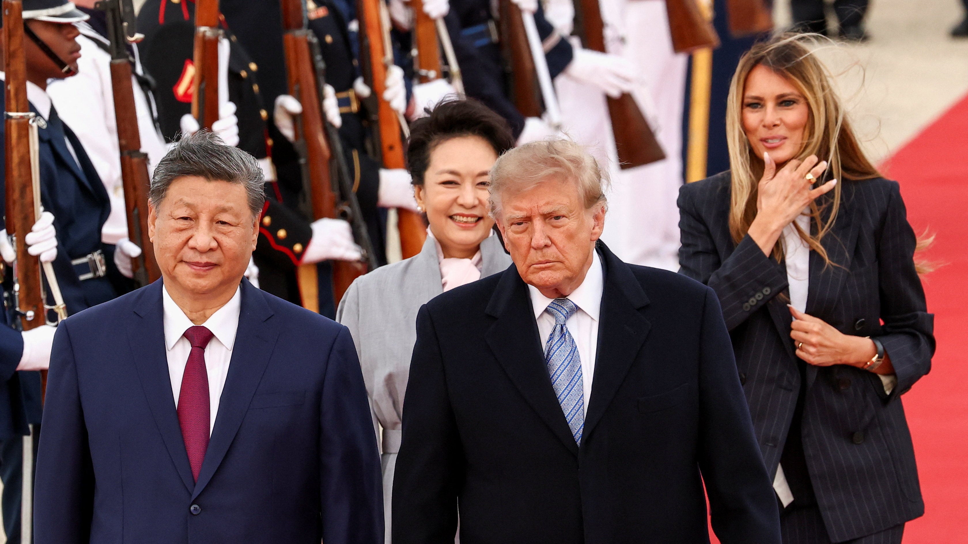 US President Donald Trump and US first lady Melania Trump walk with China’s President Xi Jinping and his wife Peng Liyuan upon their arrival at Joint Base Andrews, Maryland. Photo: Reuters
