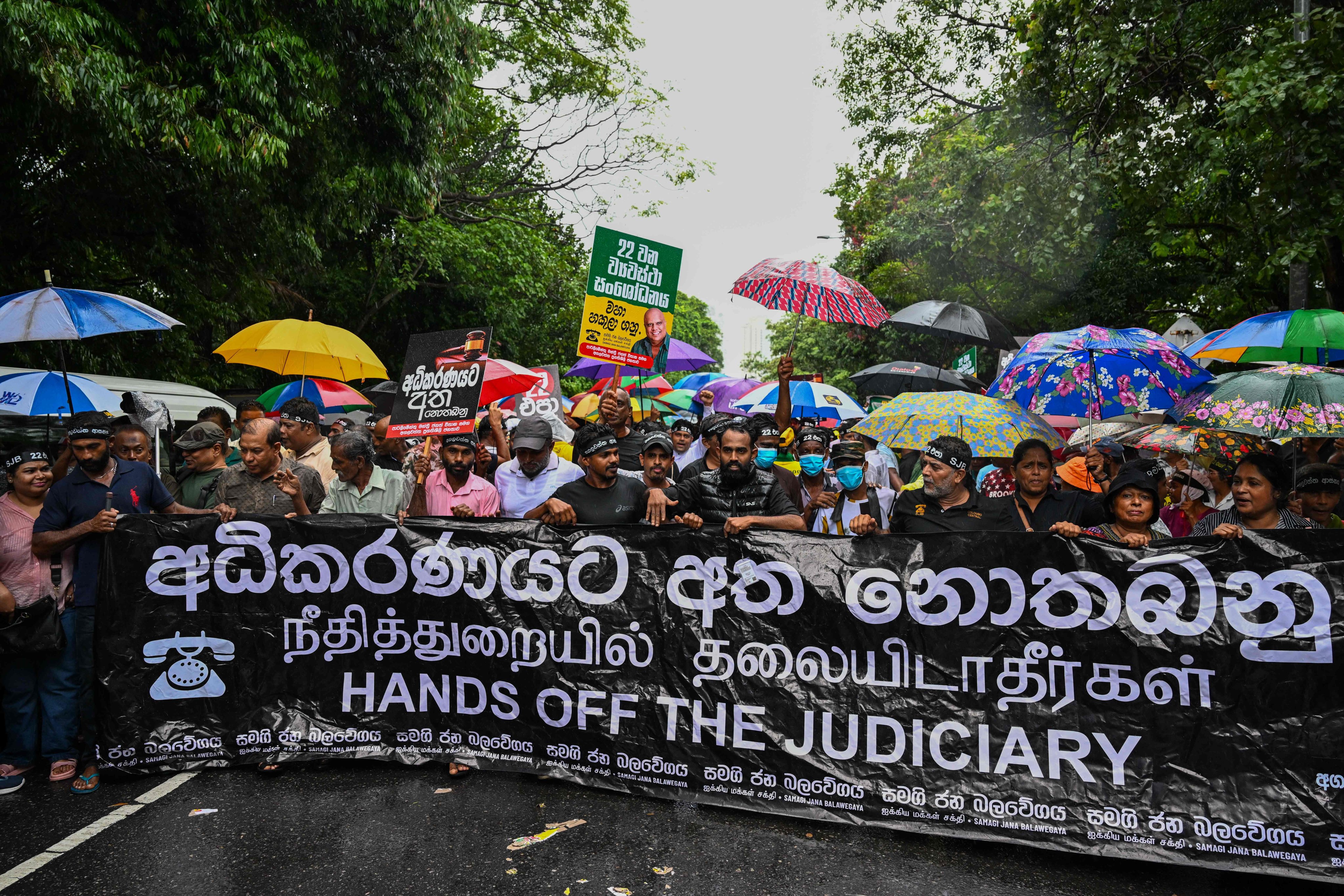 Sri Lanka’s Samagi Jana Balawegaya party supporters protest near the parliament in Colombo on Thursday against a constitutional amendment proposed by the government to extend the retirement age of judges. Photo: AFP